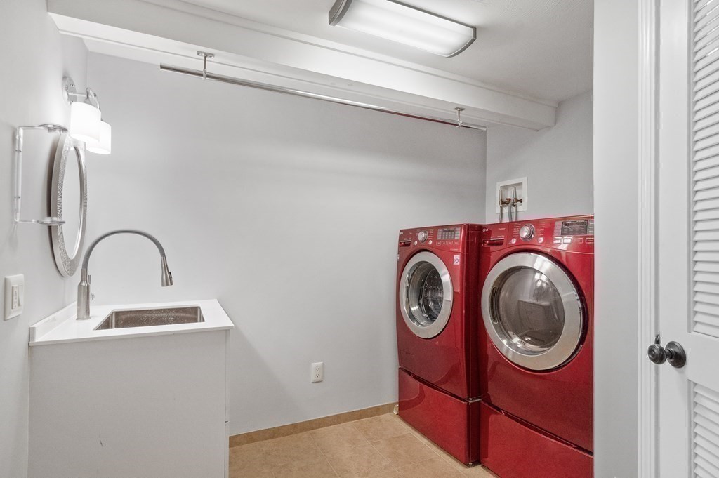 113 Deborah Road Newton, MA 02459 - Photo 29 of 34 a utility room with dryer and washer