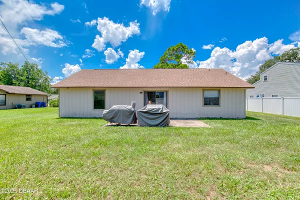 a house view with a garden space