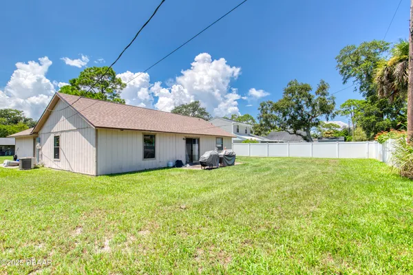 a house view with a garden space