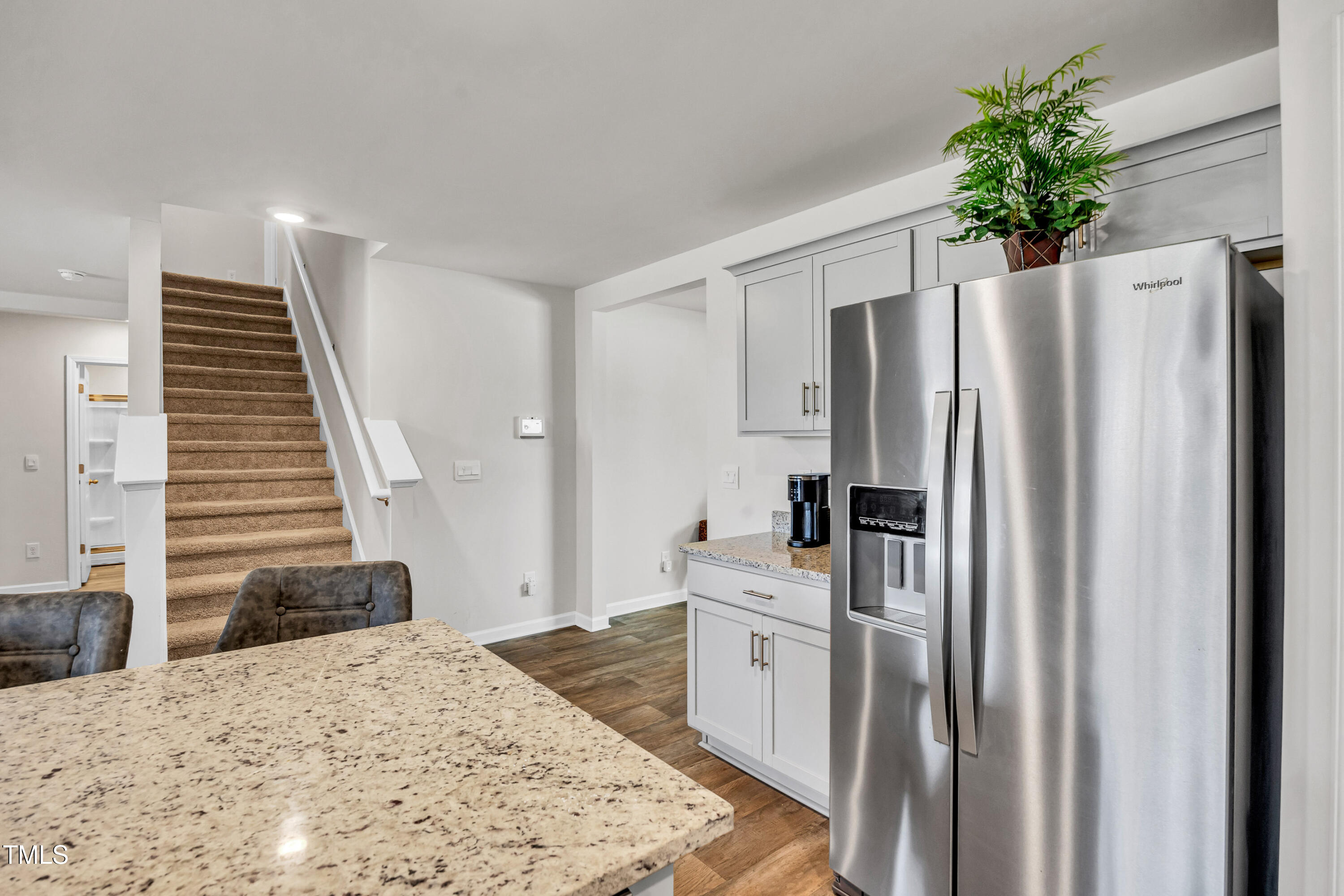 2923 Cullens Drive Graham, NC 27253 - Photo 10 of 48 a kitchen with white cabinets and stainless steel appliances