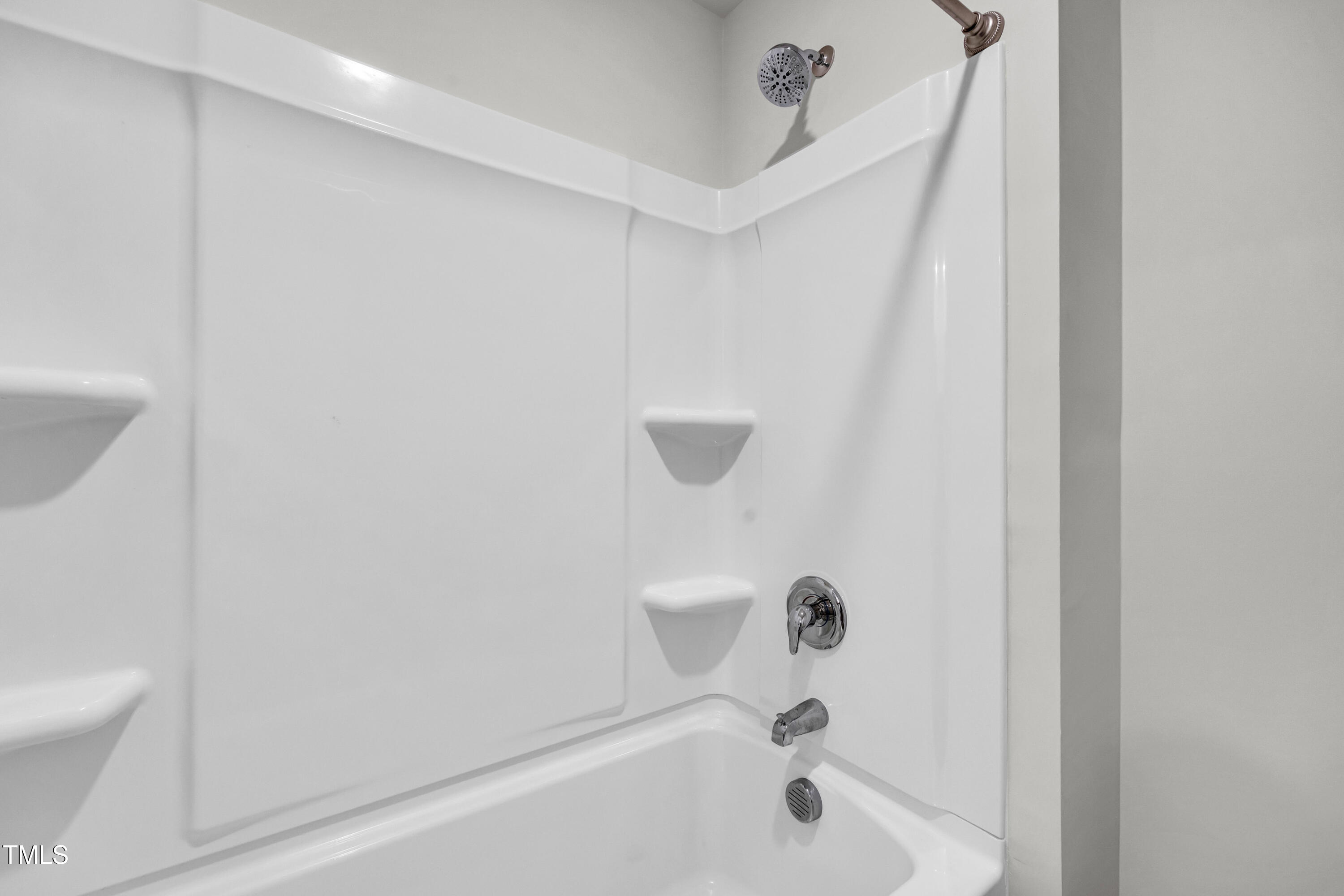 2923 Cullens Drive Graham, NC 27253 - Photo 19 of 48 a bathroom with a bathtub