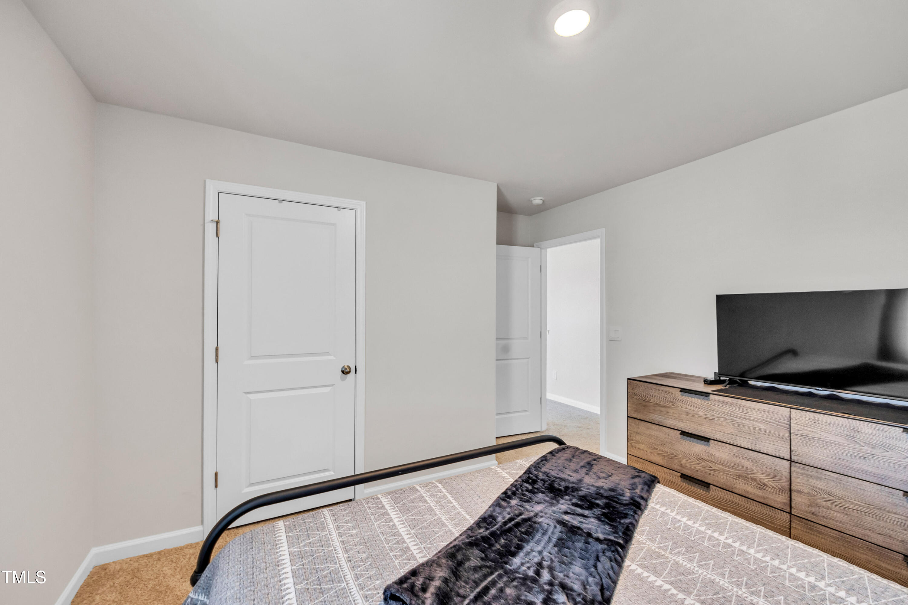 2923 Cullens Drive Graham, NC 27253 - Photo 21 of 48 a bedroom with bed and flat screen tv