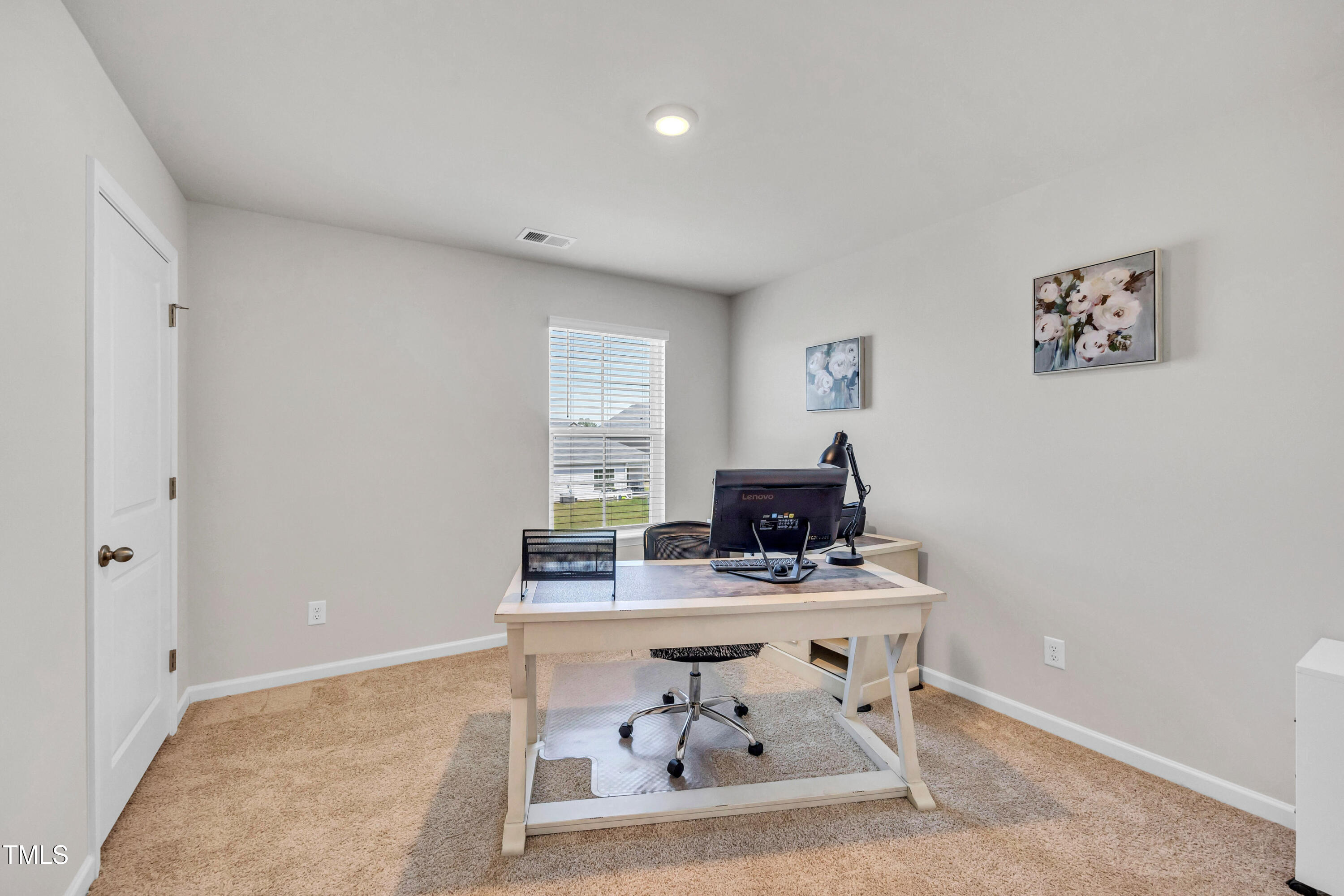 2923 Cullens Drive Graham, NC 27253 - Photo 24 of 48 a room with table and chair