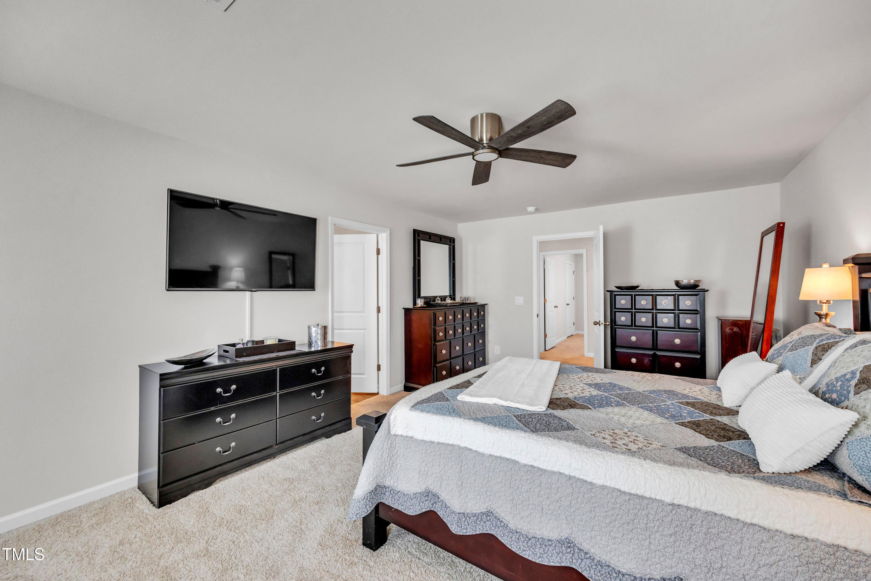 2923 Cullens Drive Graham, NC 27253 - Photo 28 of 48 a bedroom with a bed and a flat screen tv