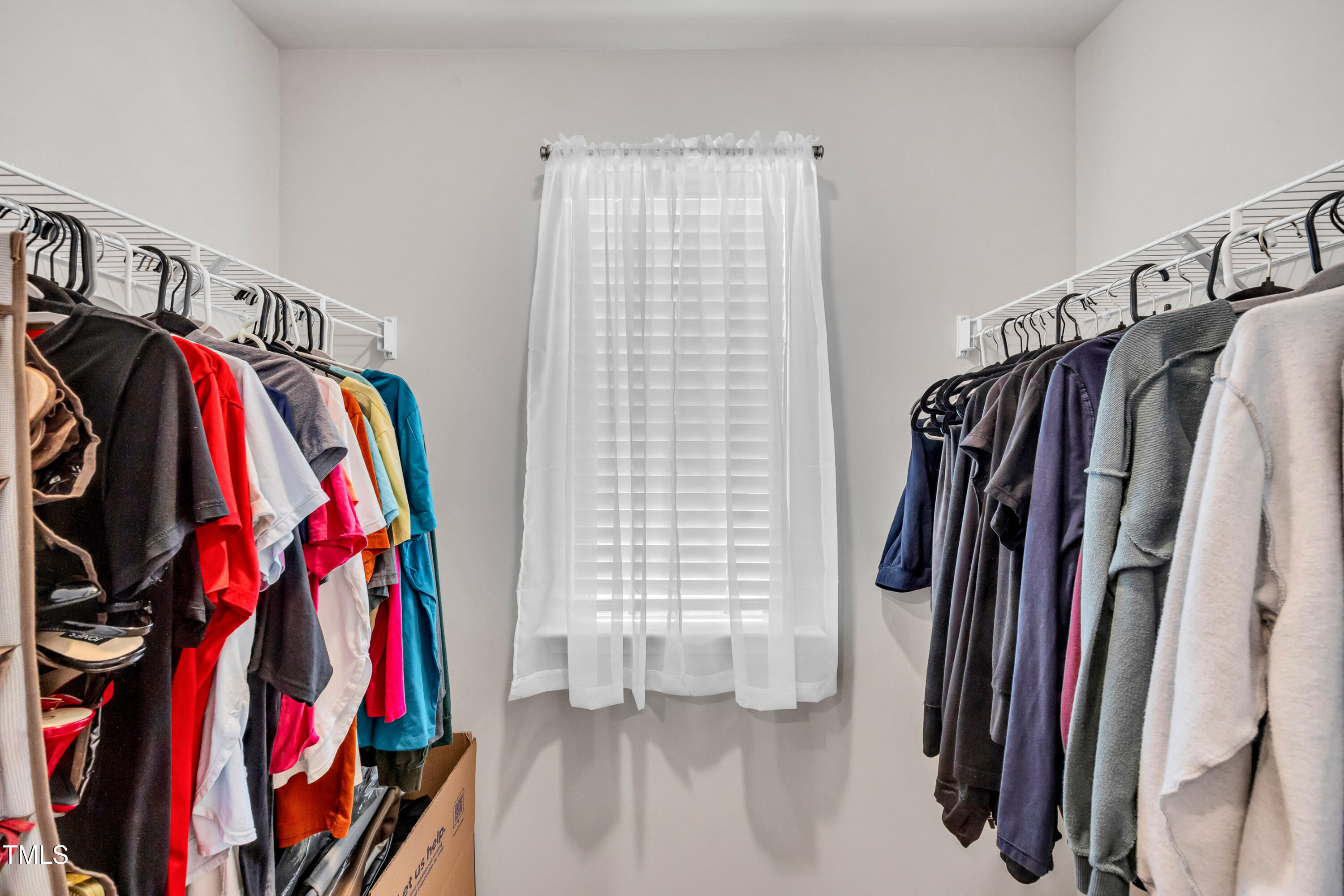 2923 Cullens Drive Graham, NC 27253 - Photo 32 of 48 a view of walk in closet with clothes and shoes