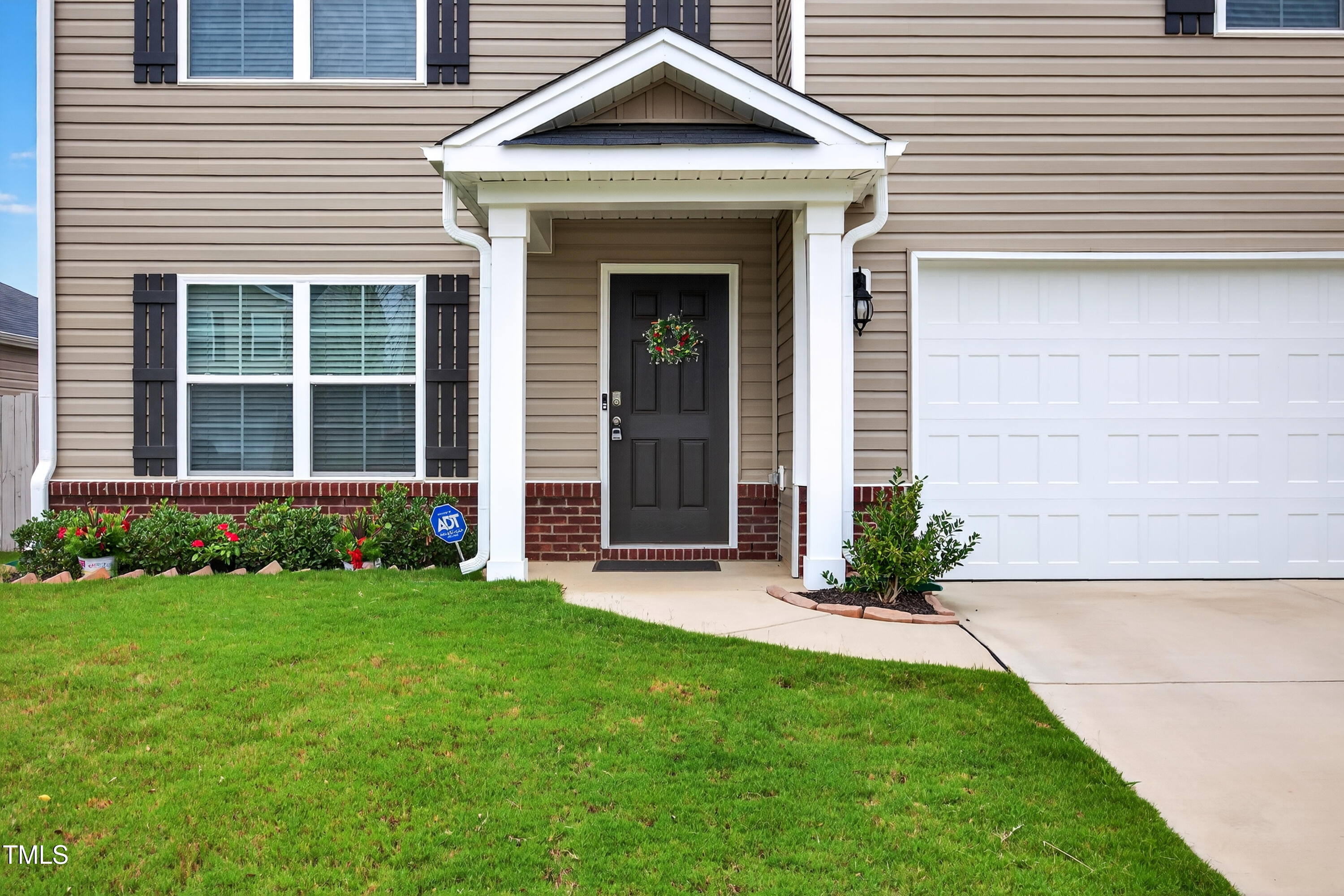 2923 Cullens Drive Graham, NC 27253 - Photo 34 of 48 a front view of a house with a yard