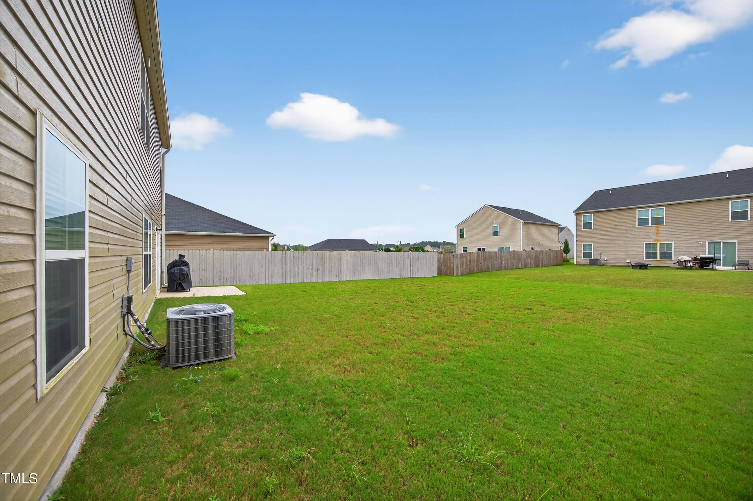 2923 Cullens Drive Graham, NC 27253 - Photo 35 of 48 a front view of a house with garden