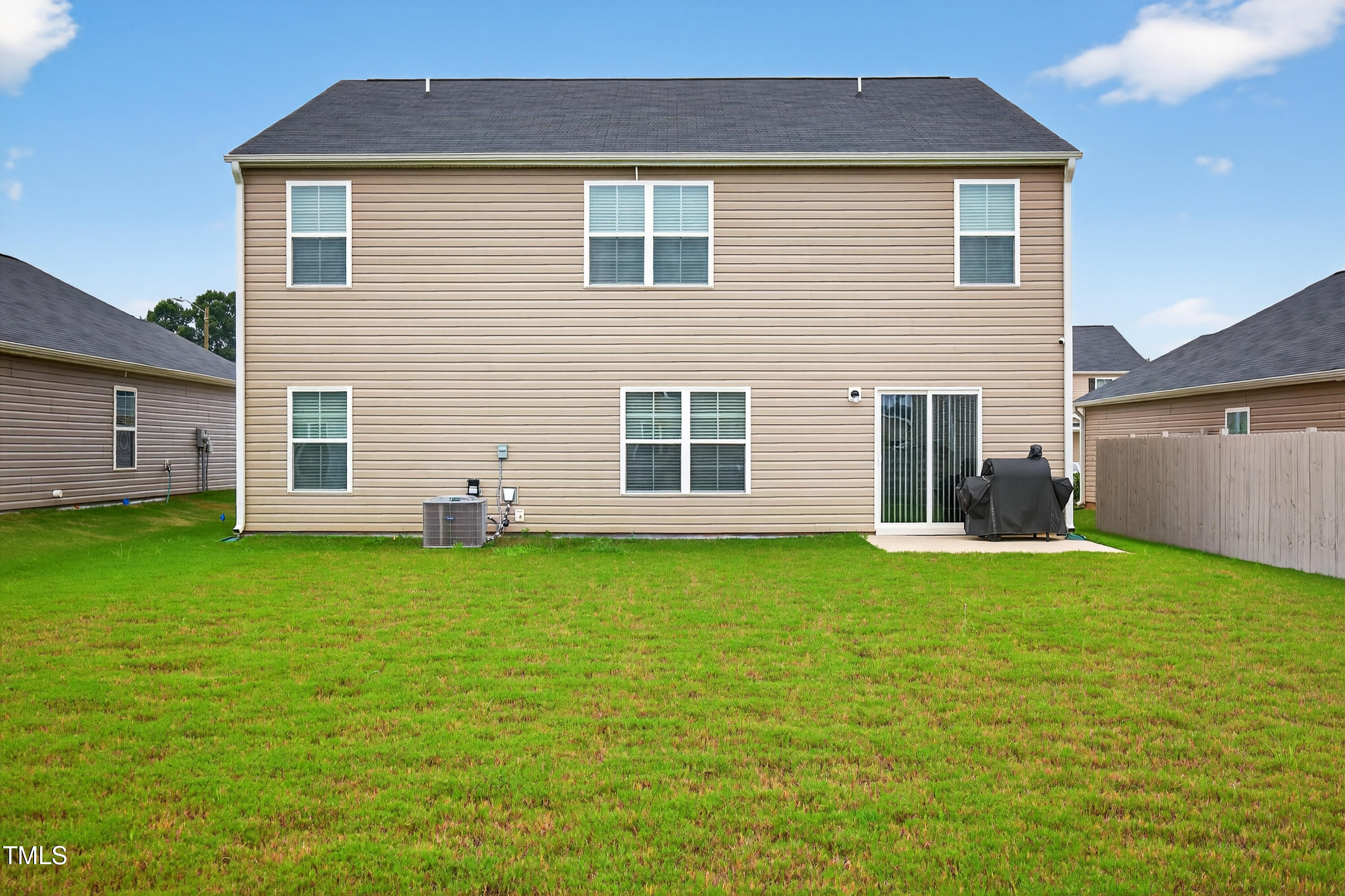 2923 Cullens Drive Graham, NC 27253 - Photo 37 of 48 a front view of a house with a garden