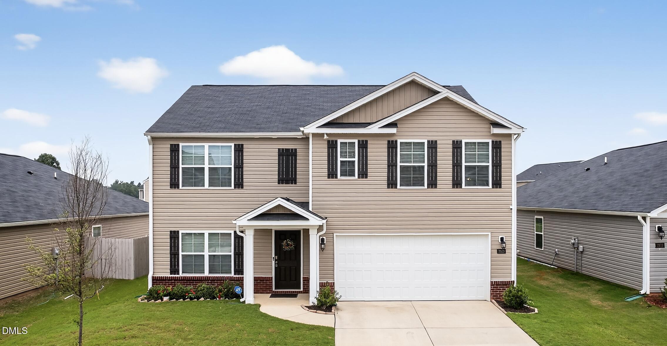 2923 Cullens Drive Graham, NC 27253 - Photo 44 of 48 a front view of a house with a yard