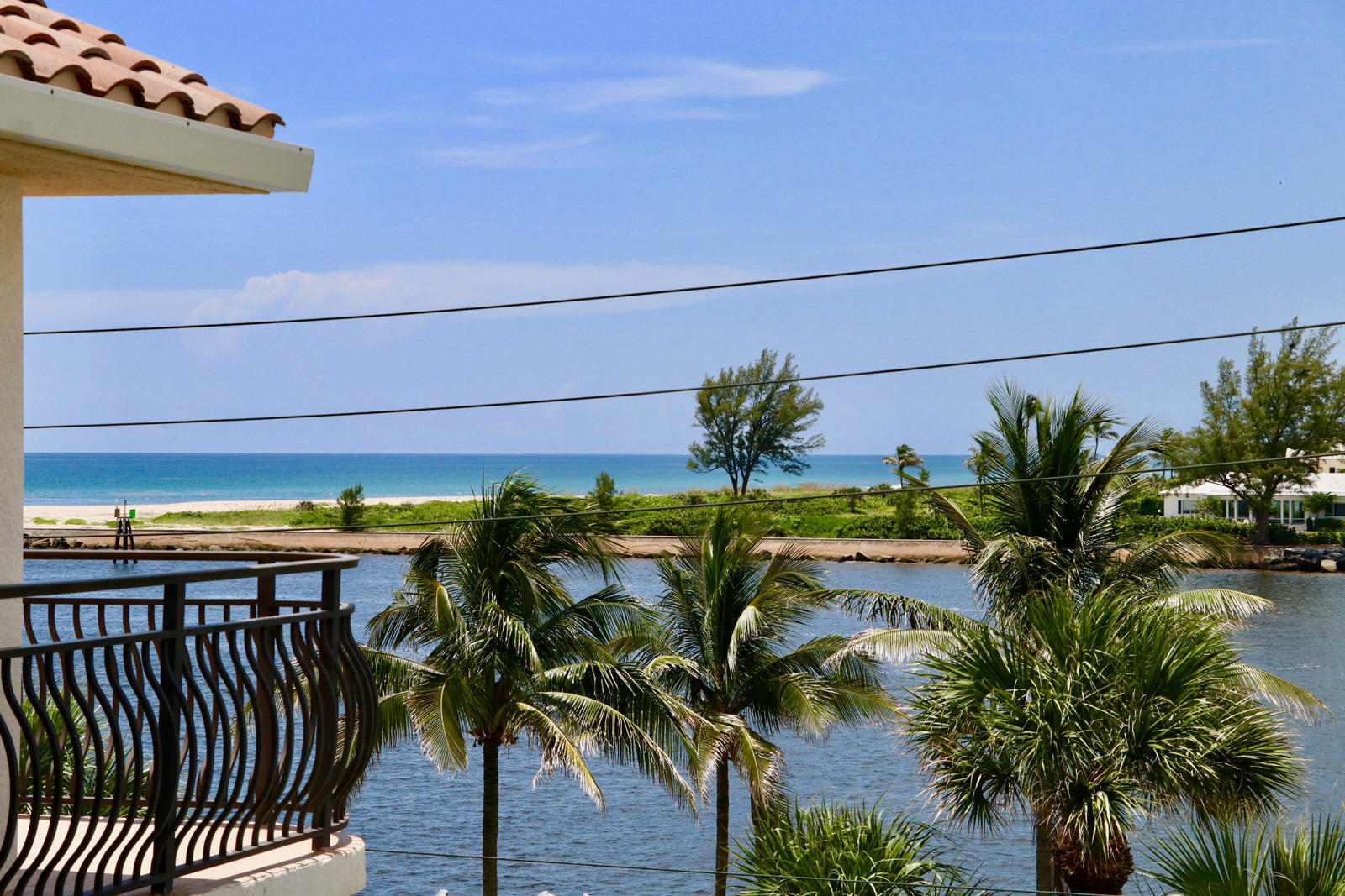 314 Inlet Way, Unit 303 Palm Beach Shores, FL 33404 - Photo 11 of 33 a picture of a building with yard and outdoor seating