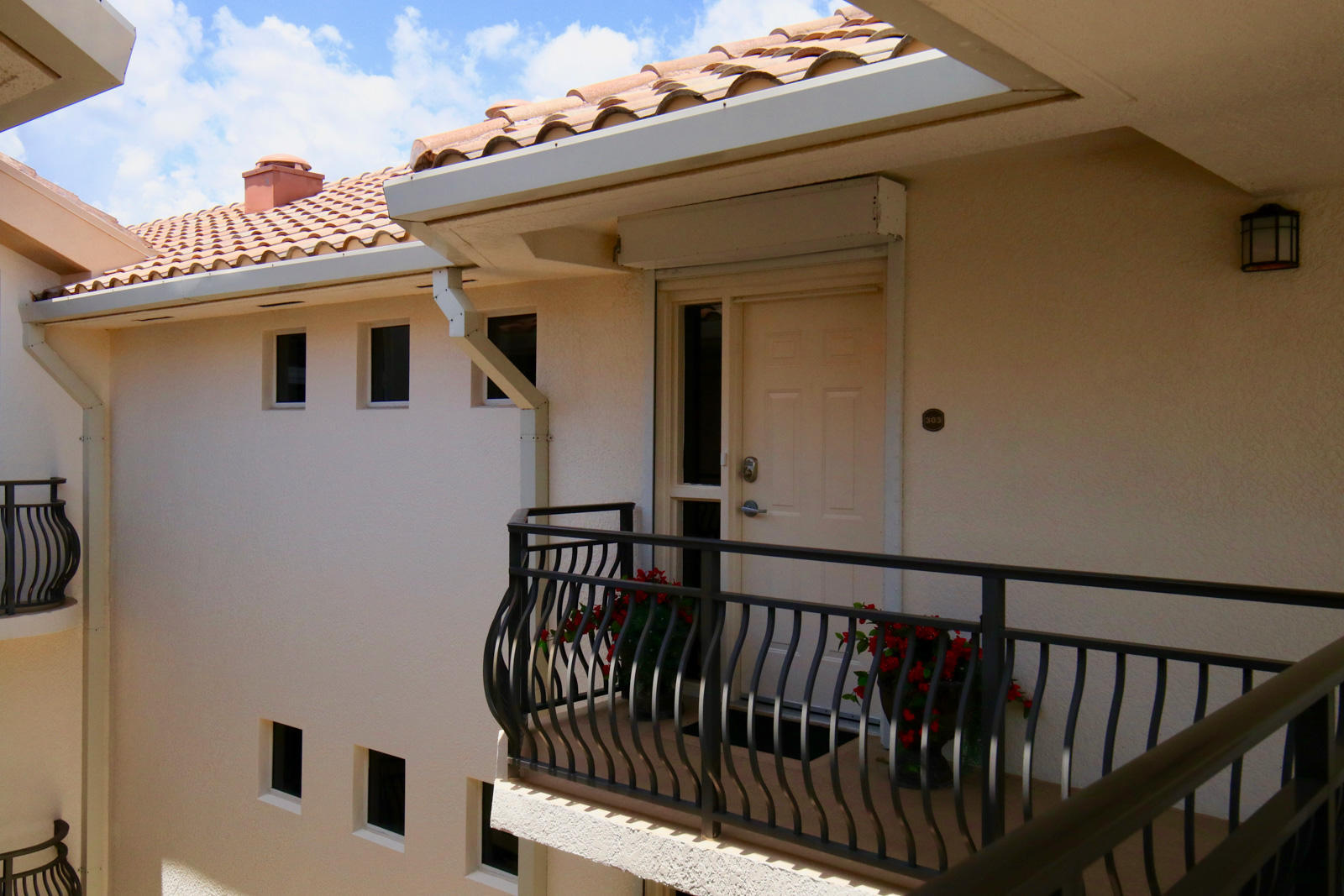 314 Inlet Way, Unit 303 Palm Beach Shores, FL 33404 - Photo 13 of 33 a view of a balcony