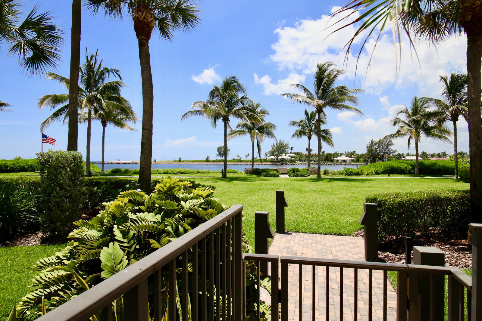 314 Inlet Way, Unit 303 Palm Beach Shores, FL 33404 - Photo 15 of 33 a view of a garden with palm trees