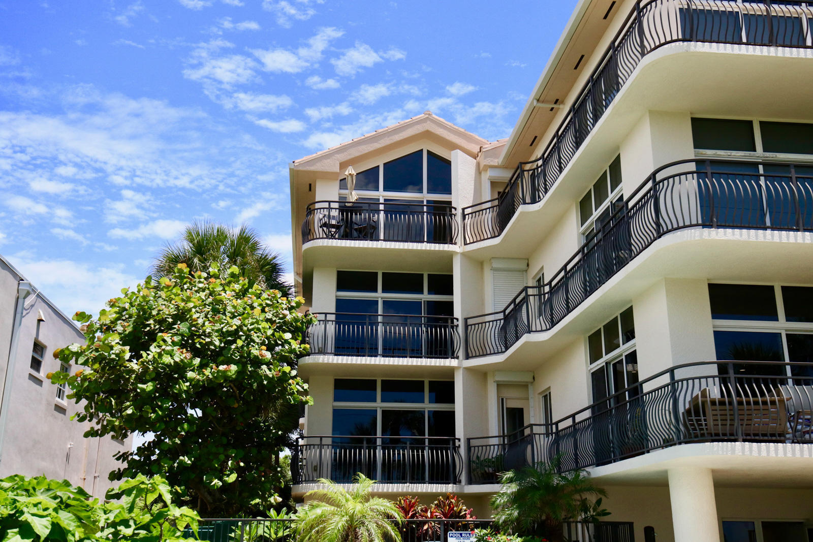 314 Inlet Way, Unit 303 Palm Beach Shores, FL 33404 - Photo 17 of 33 a view of front a house with a small yard