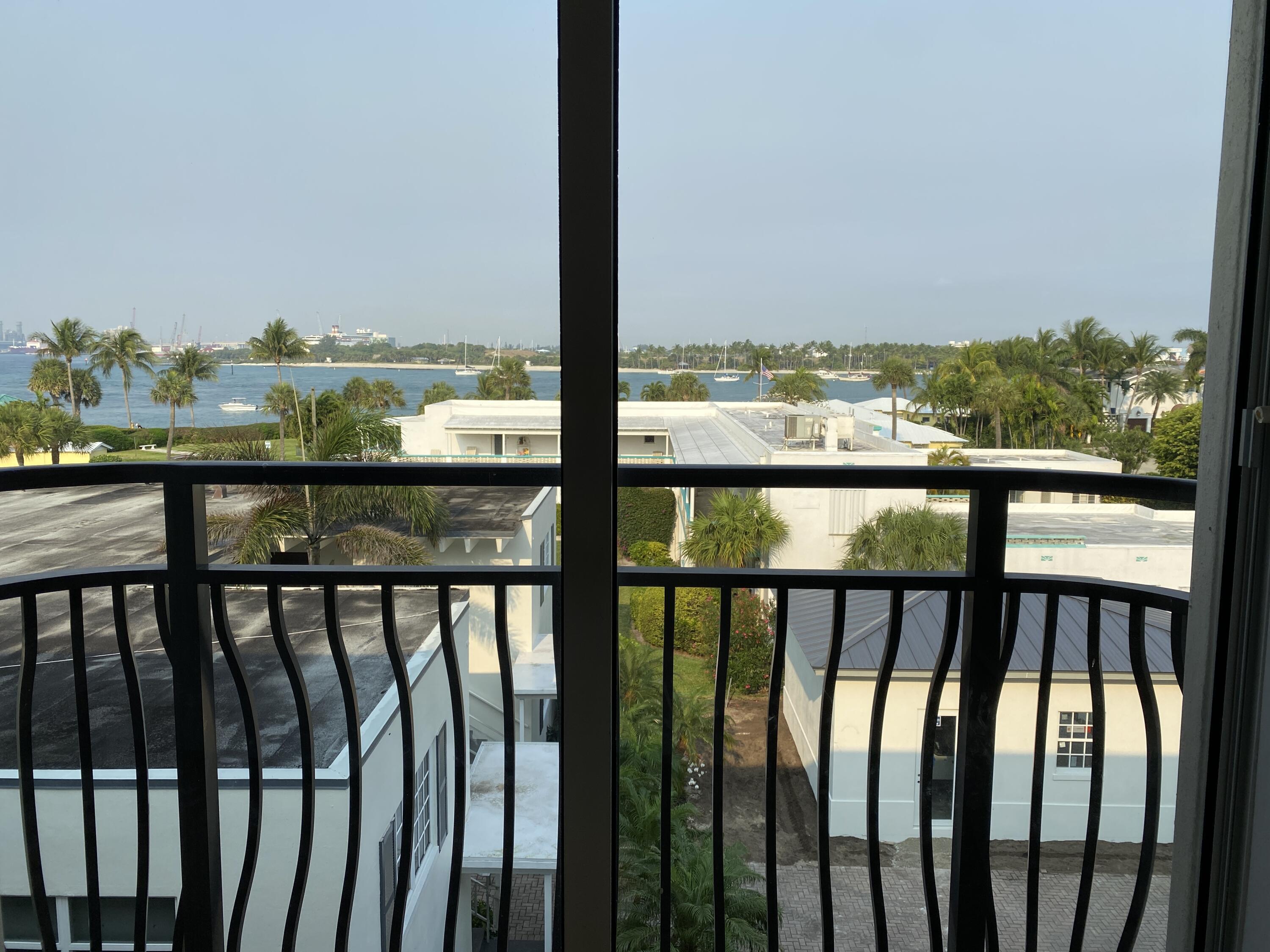 314 Inlet Way, Unit 303 Palm Beach Shores, FL 33404 - Photo 22 of 33 a view of a city skyline from a balcony