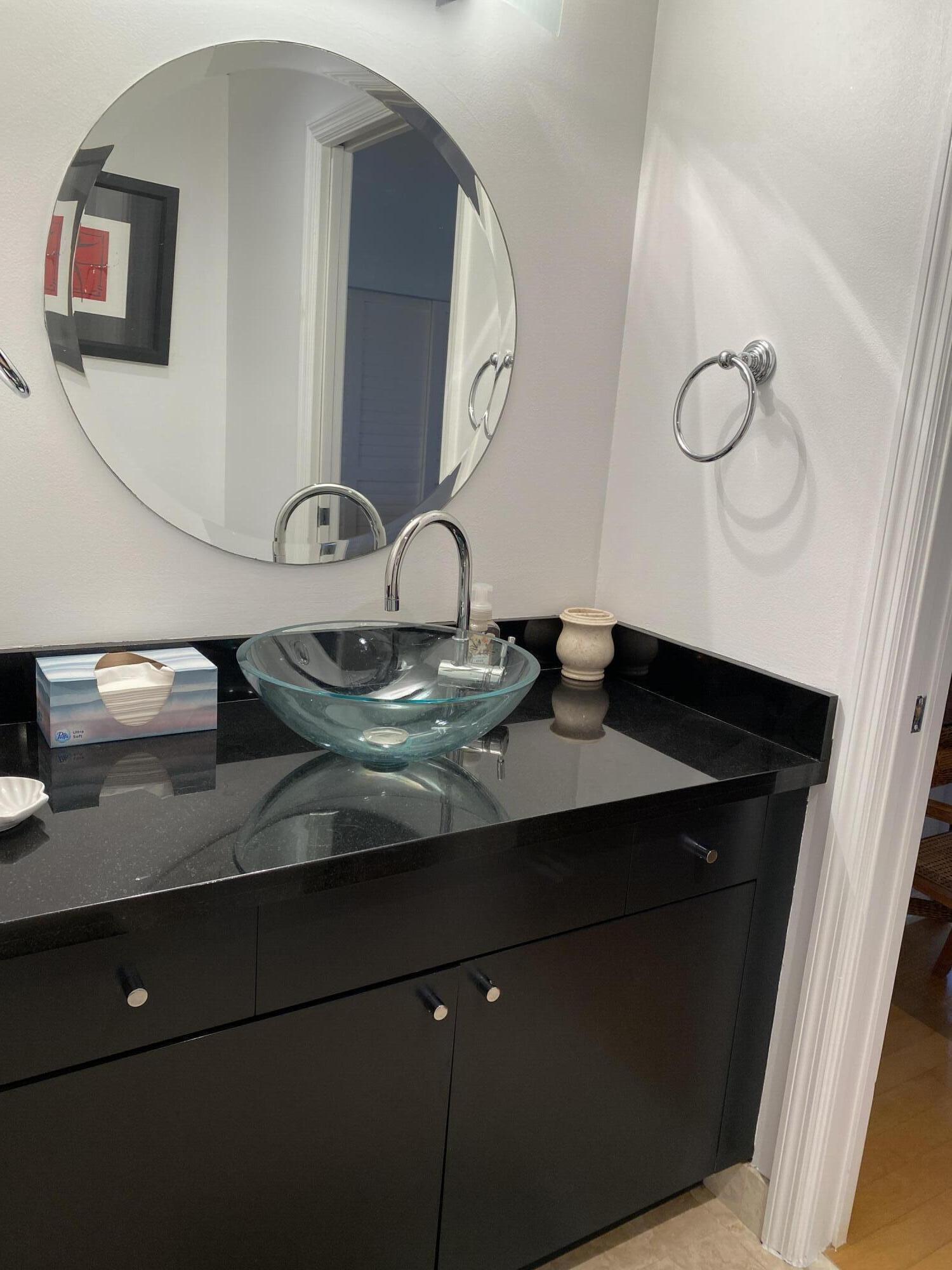 314 Inlet Way, Unit 303 Palm Beach Shores, FL 33404 - Photo 26 of 33 a close view of sink and mirror