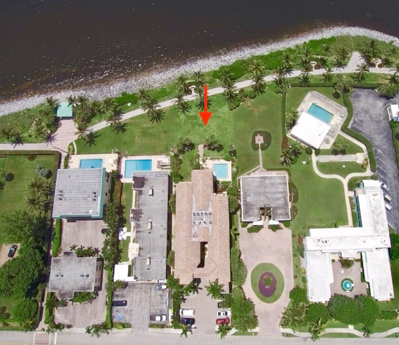 314 Inlet Way, Unit 303 Palm Beach Shores, FL 33404 - Photo 31 of 33 an aerial view of residential house with outdoor space and swimming pool
