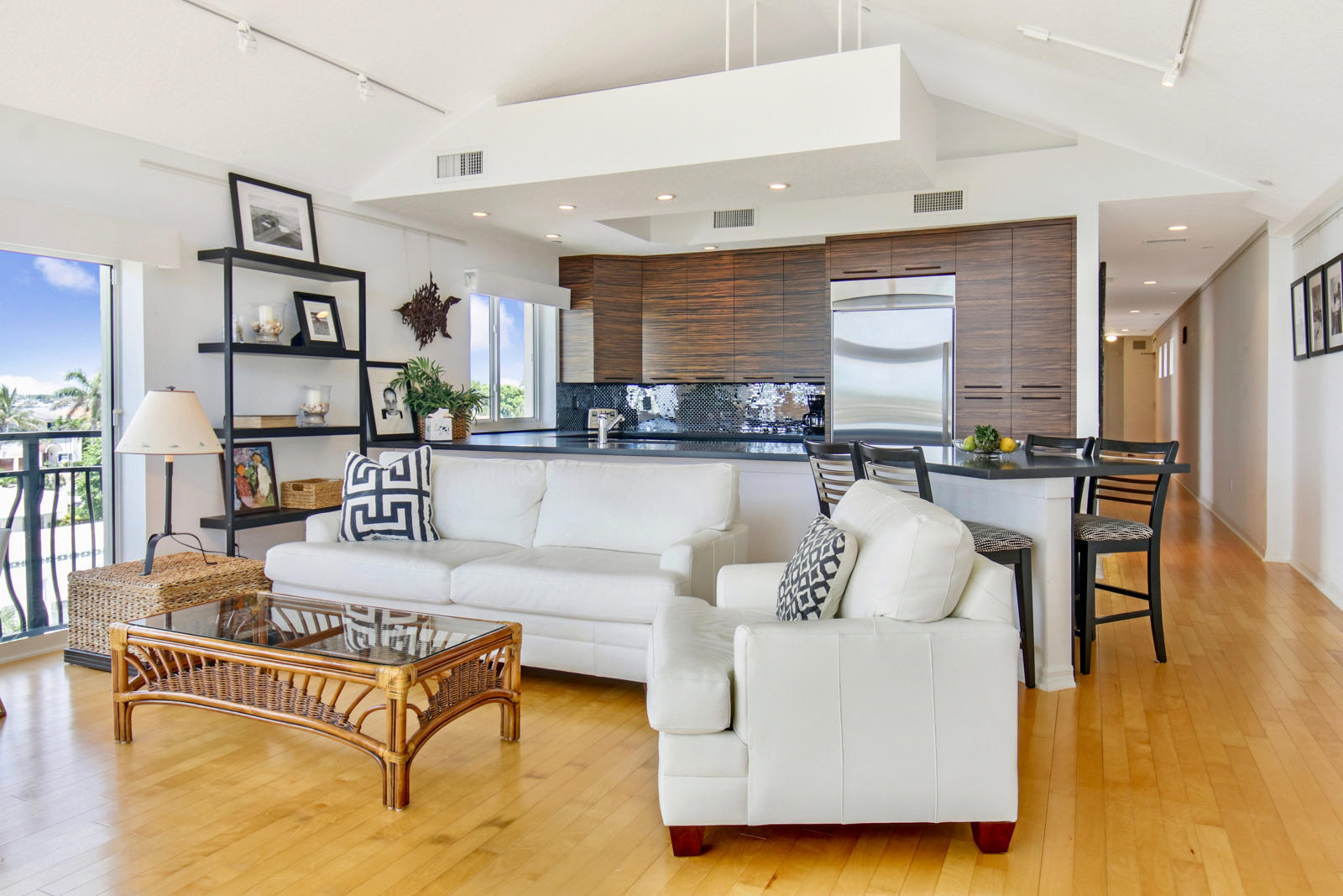 314 Inlet Way, Unit 303 Palm Beach Shores, FL 33404 - Photo 8 of 33 a living room with furniture and kitchen view