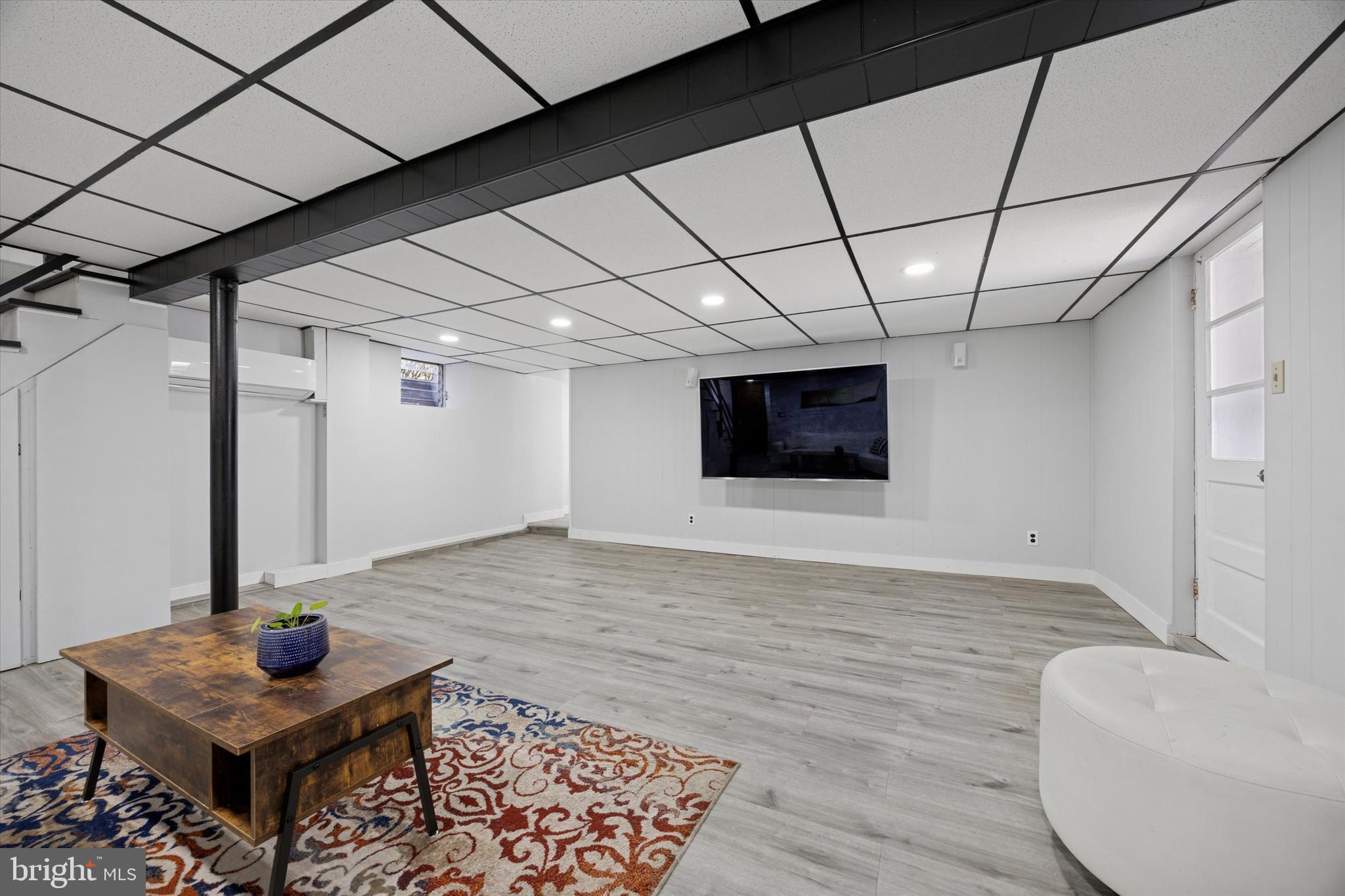 217 Windsor Avenue Upper Darby, PA 19082 - Photo 23 of 36 a view of a room with wooden floor