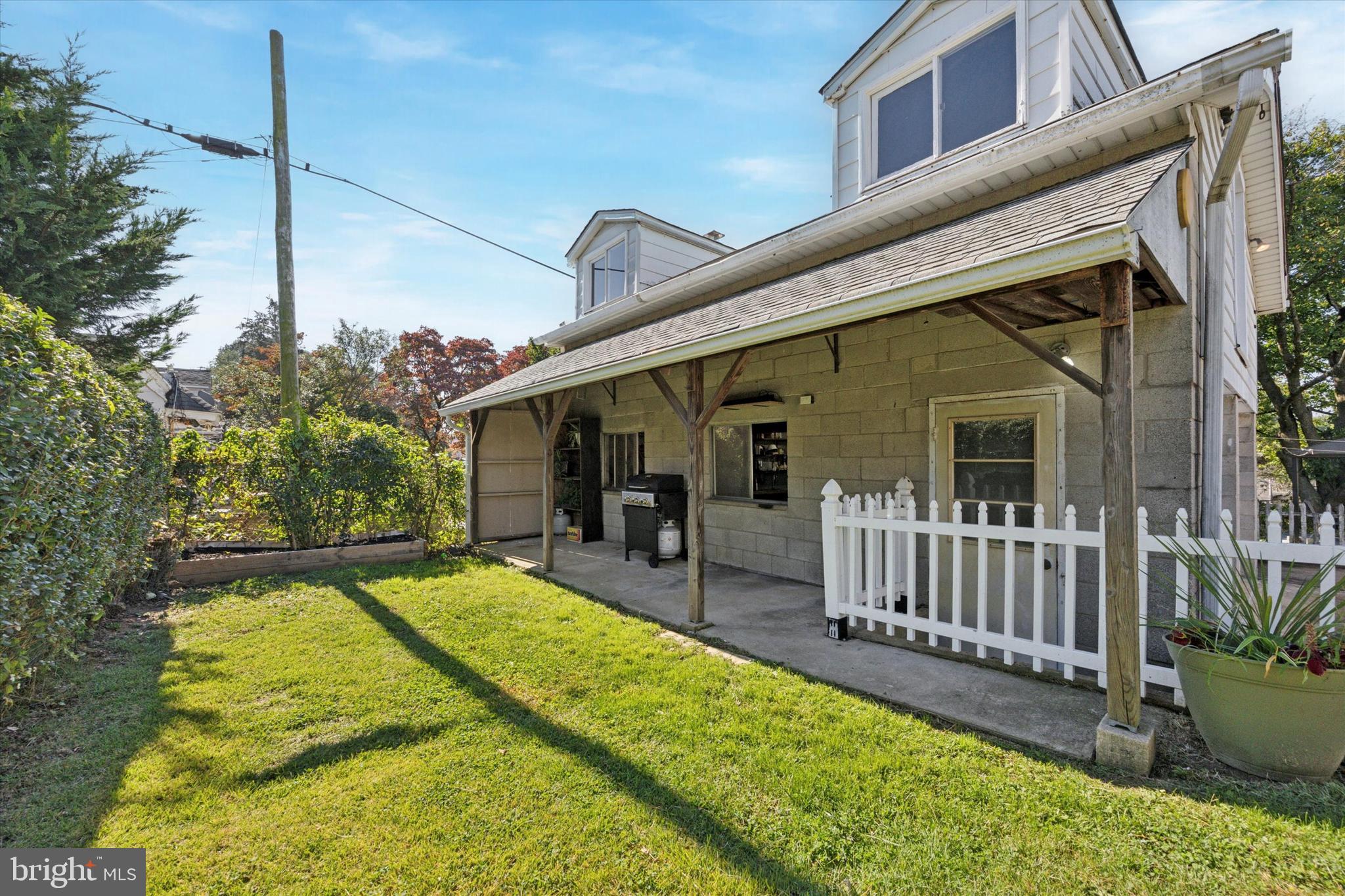 217 Windsor Avenue Upper Darby, PA 19082 - Photo 28 of 36 a view of a house with backyard and porch