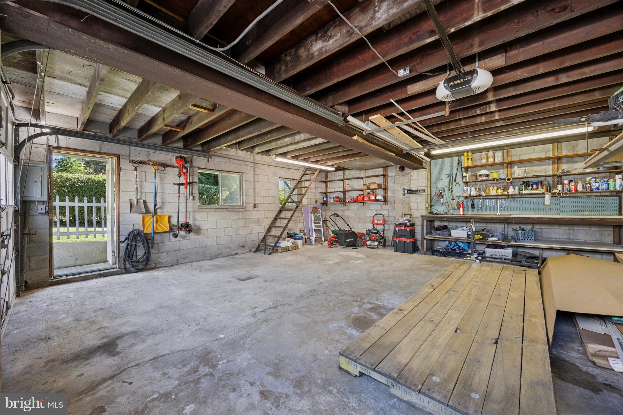 217 Windsor Avenue Upper Darby, PA 19082 - Photo 29 of 36 a view of the parking space with a garage