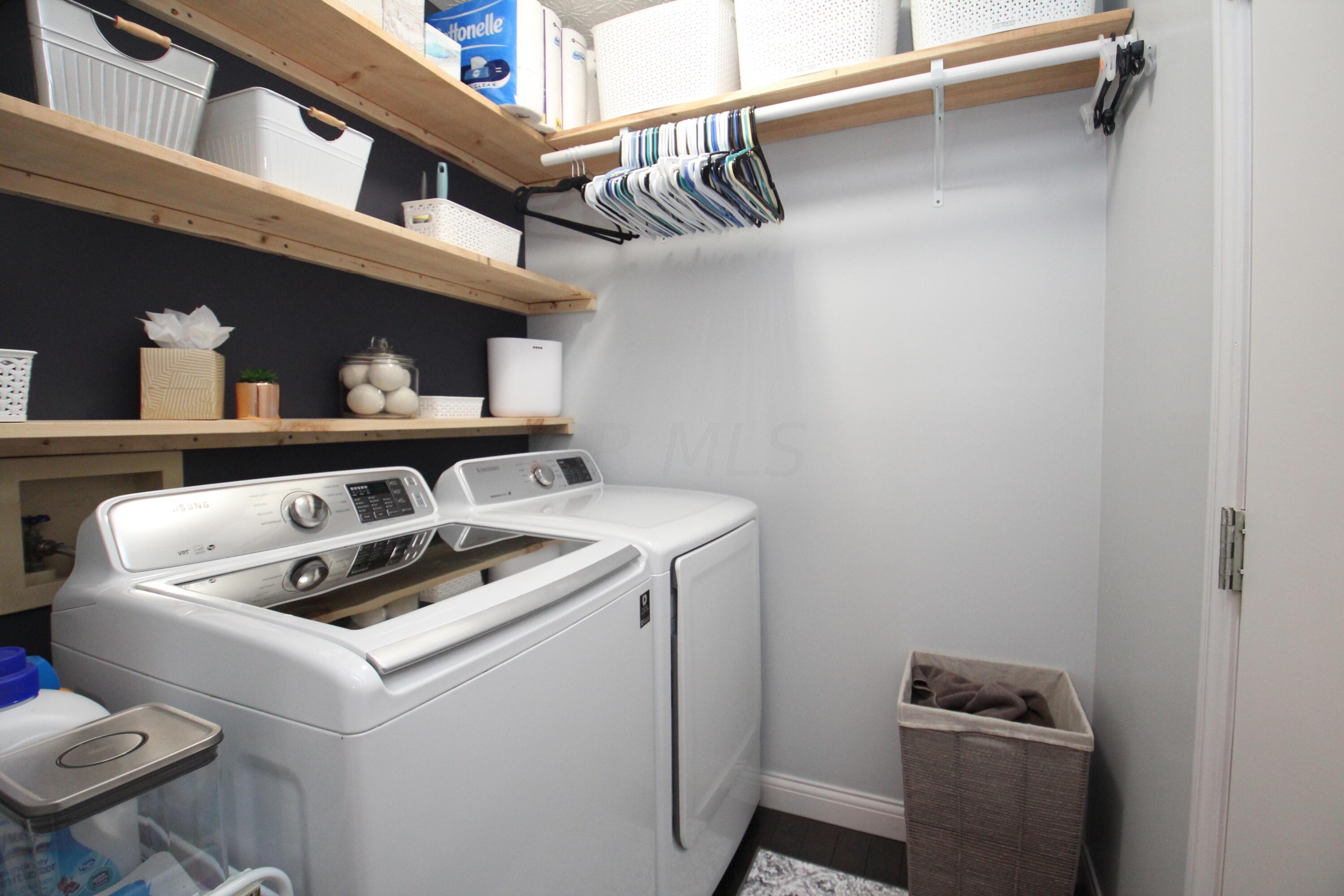 5625 Davidson Road Hilliard, OH 43026 - Photo 28 of 51 first floor laundry/mud room with lots of storage