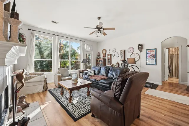 a living room with furniture and a window