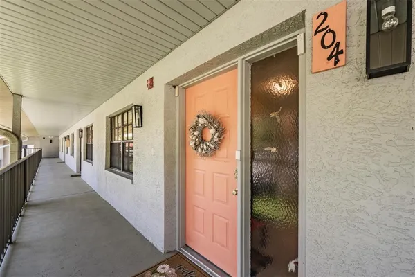 a view of a hallway with entryway