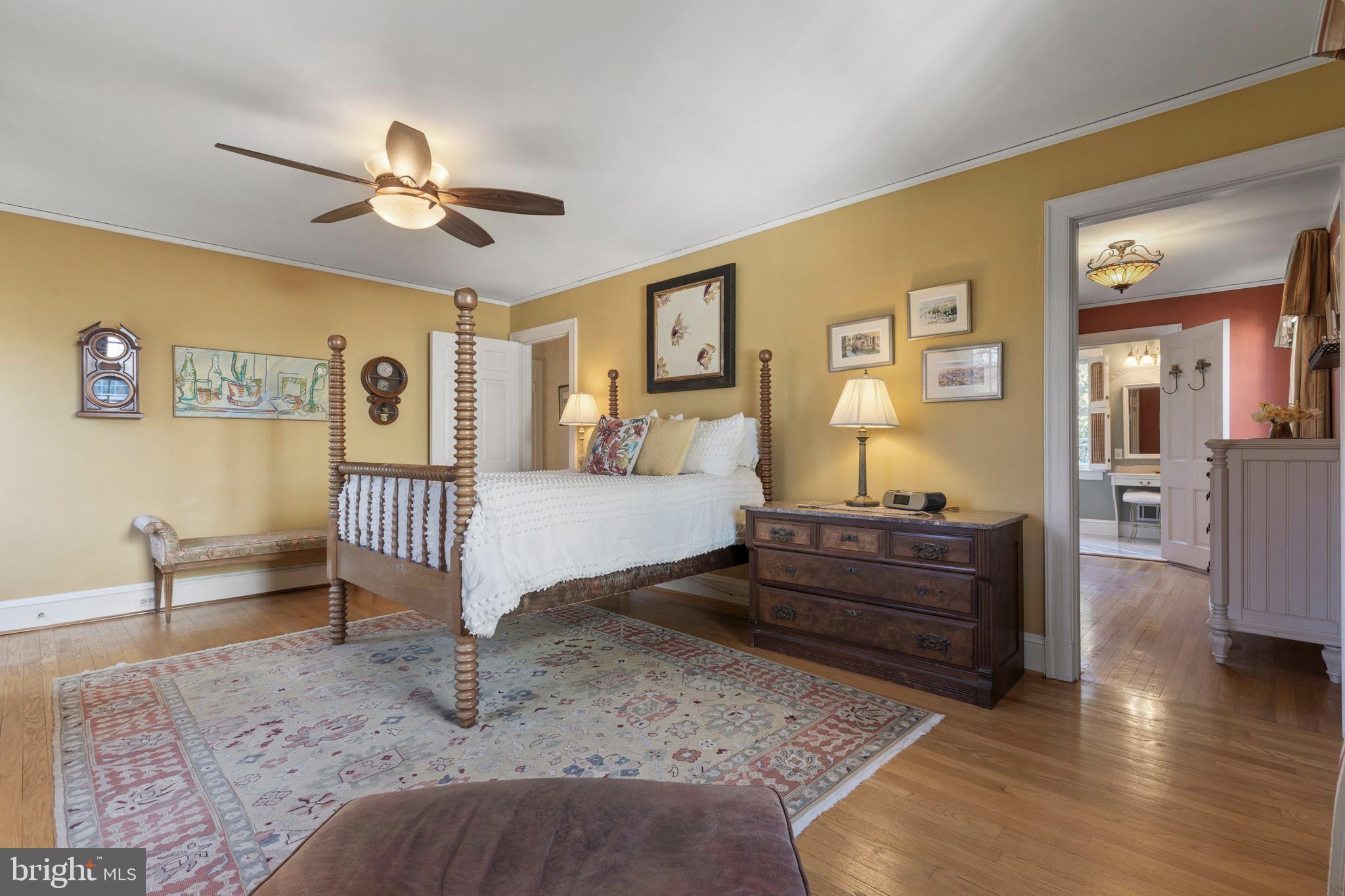 329 Tunbridge Road Baltimore, MD 21212 - Photo 33 of 76 a bed room with a bed and a chandelier