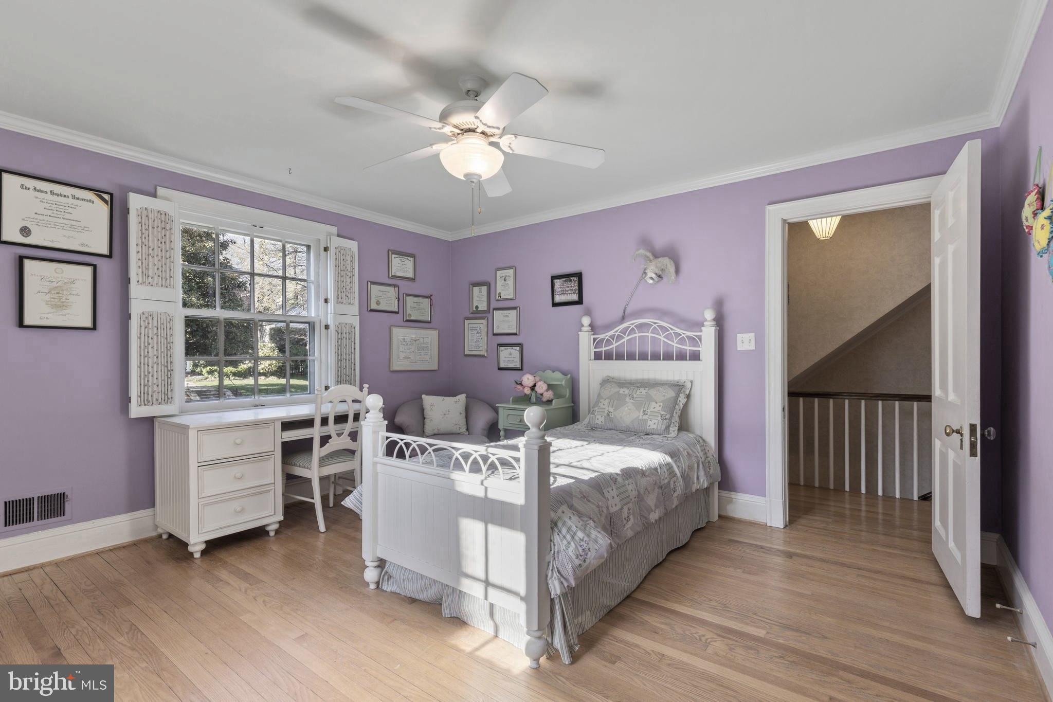329 Tunbridge Road Baltimore, MD 21212 - Photo 42 of 76 a bedroom with a bed and a table