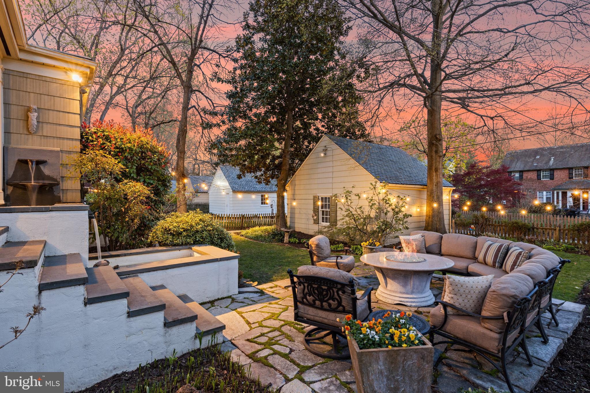 329 Tunbridge Road Baltimore, MD 21212 - Photo 61 of 76 a view of a patio with couches and a fire pit and a couple of lawn chairs