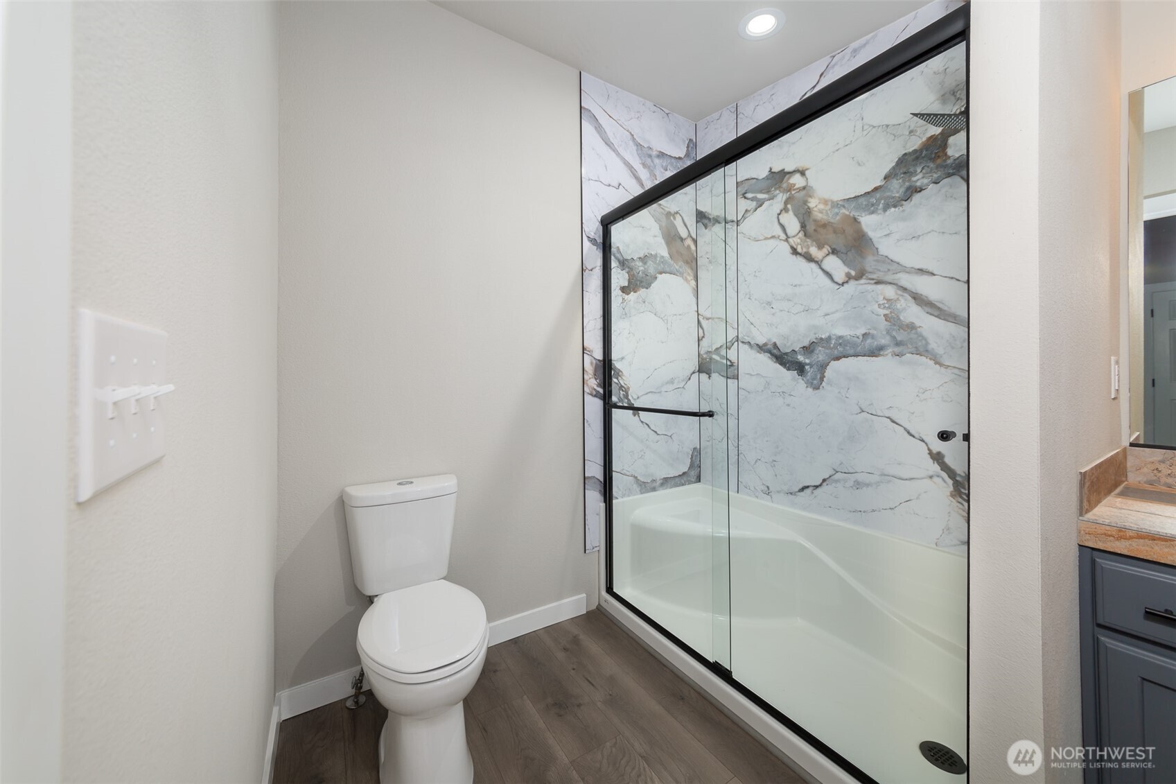 225 North Lake Roesiger Road Snohomish, WA 98290 - Photo 16 of 40 a bathroom with a toilet and shower