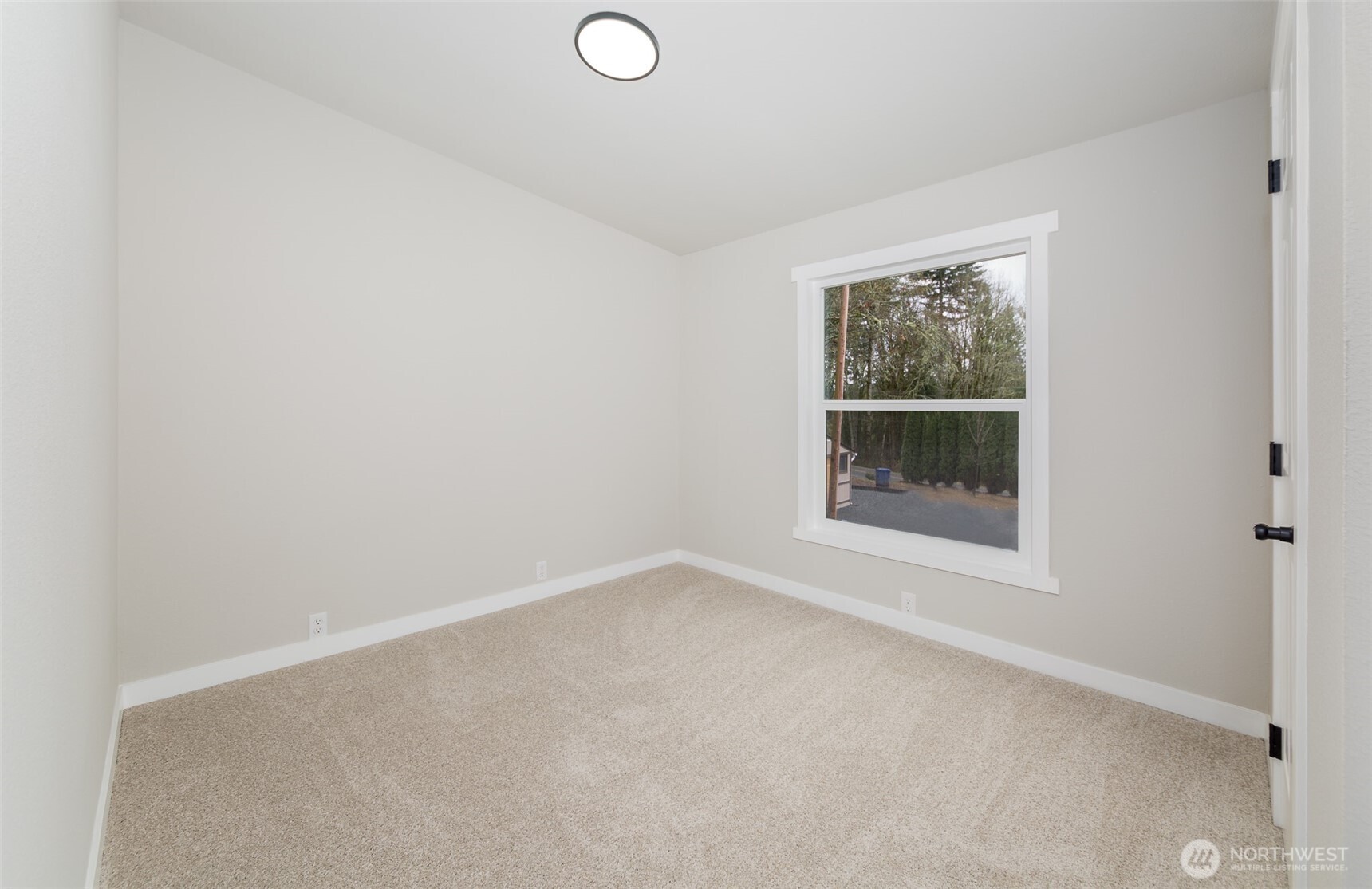 225 North Lake Roesiger Road Snohomish, WA 98290 - Photo 18 of 40 a view of empty room with window