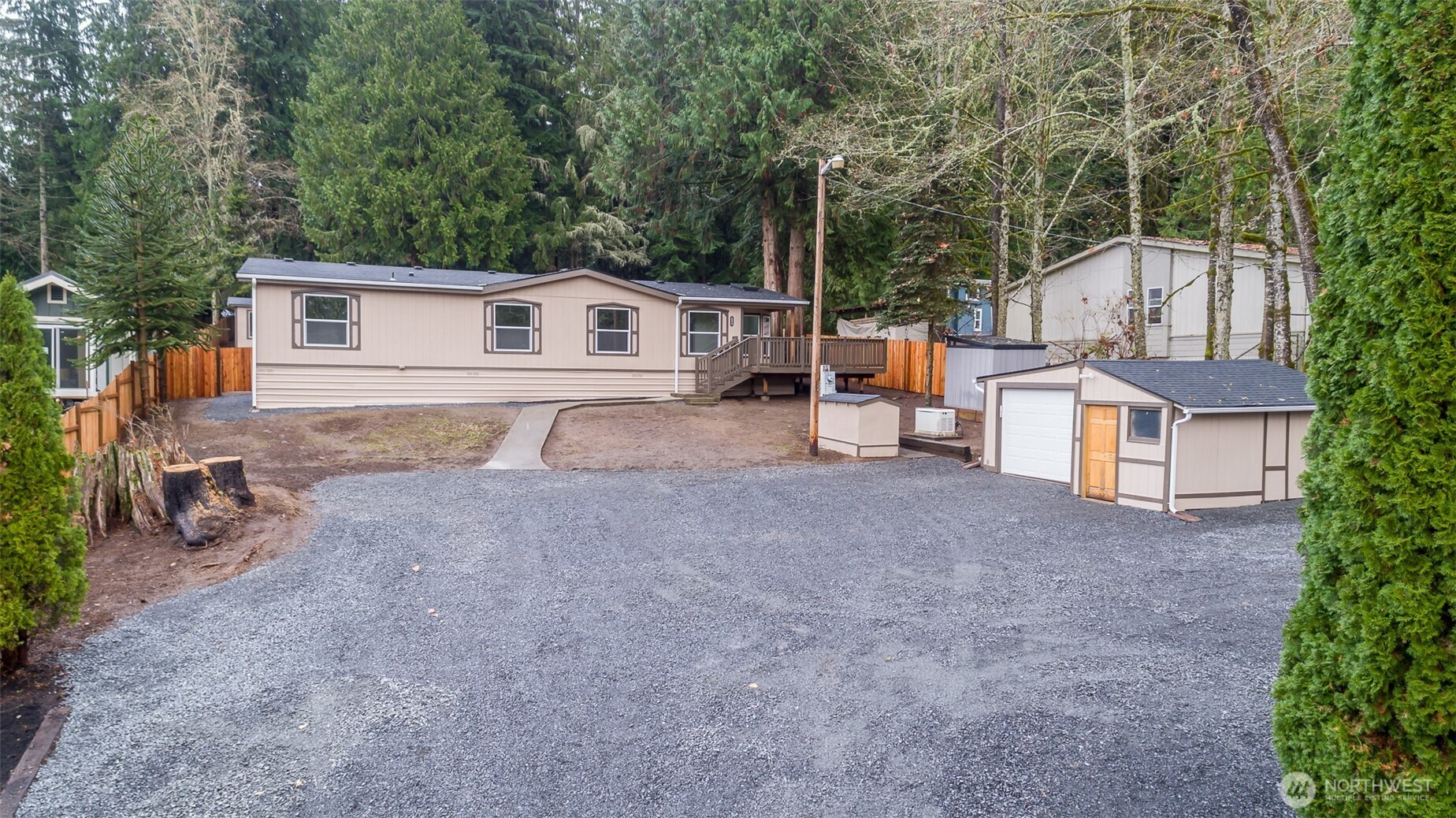 225 North Lake Roesiger Road Snohomish, WA 98290 - Photo 2 of 40 front view of a house with a yard