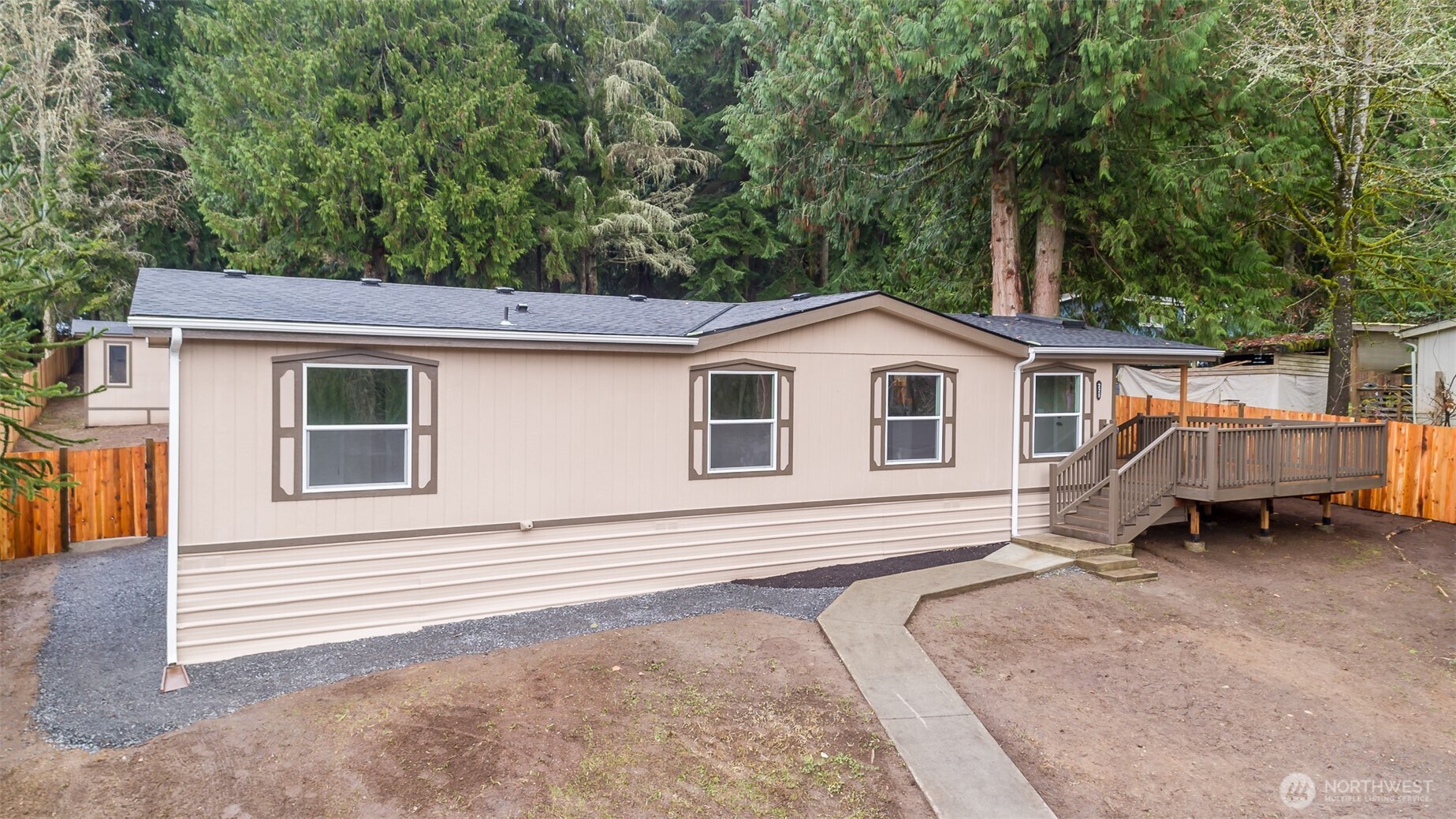 225 North Lake Roesiger Road Snohomish, WA 98290 - Photo 28 of 40 a view of a house with a backyard and a window