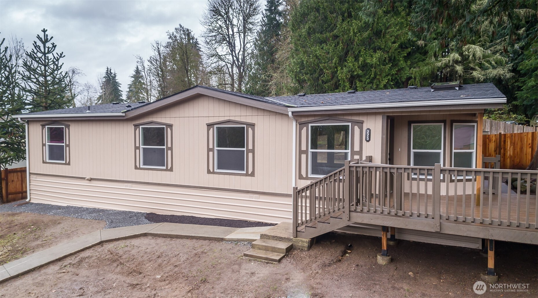 225 North Lake Roesiger Road Snohomish, WA 98290 - Photo 29 of 40 a view of a house with a yard and deck