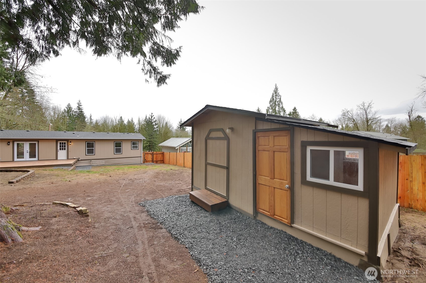 225 North Lake Roesiger Road Snohomish, WA 98290 - Photo 34 of 40 a view of a house with a backyard