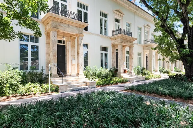 a view of a building with a garden