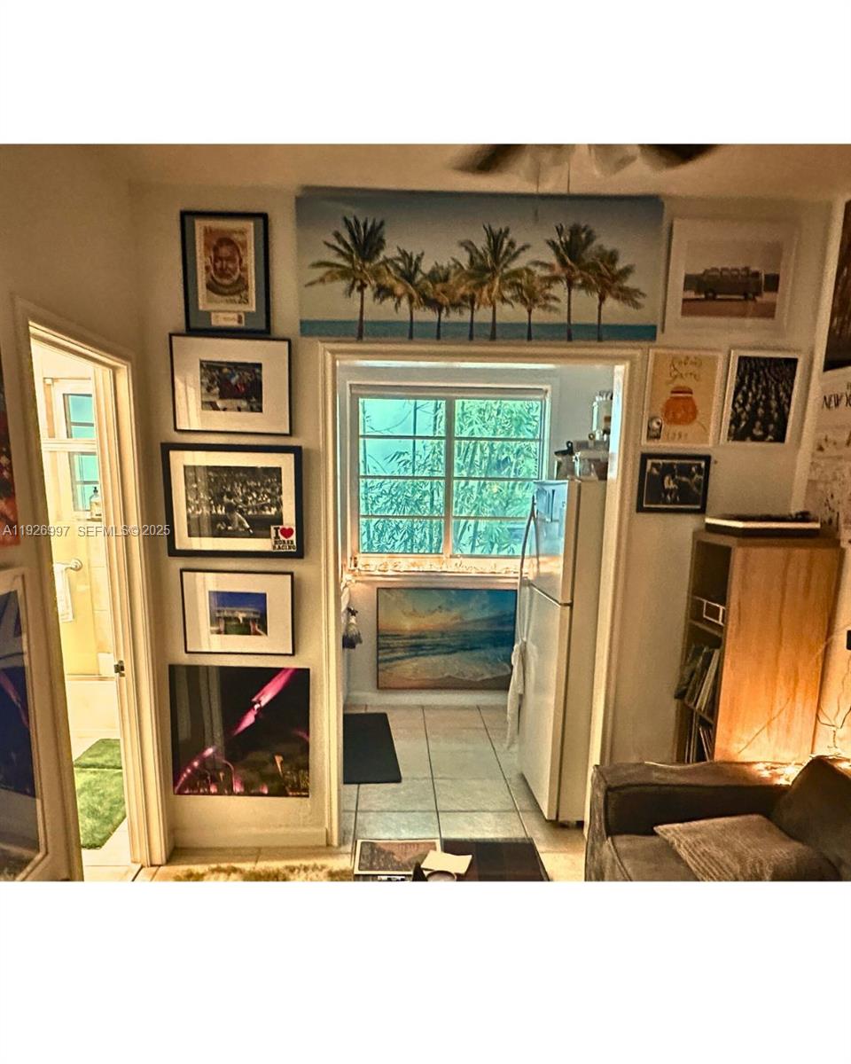 349 Meridian Avenue, Unit B202 Miami Beach, FL 33139 - Photo 16 of 20 a black and white photo of a living room