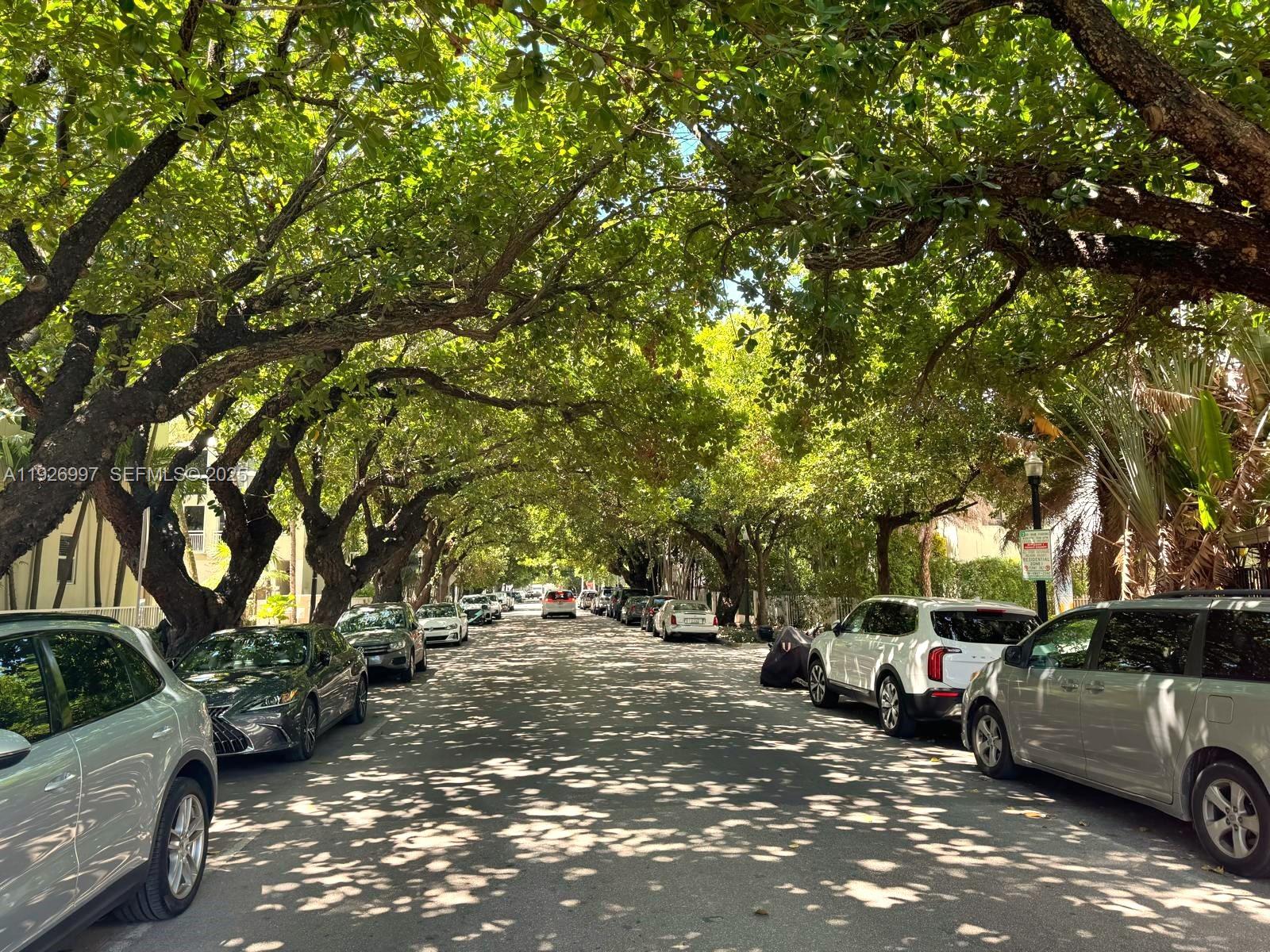 349 Meridian Avenue, Unit B202 Miami Beach, FL 33139 - Photo 5 of 20 a view of street with parked cars