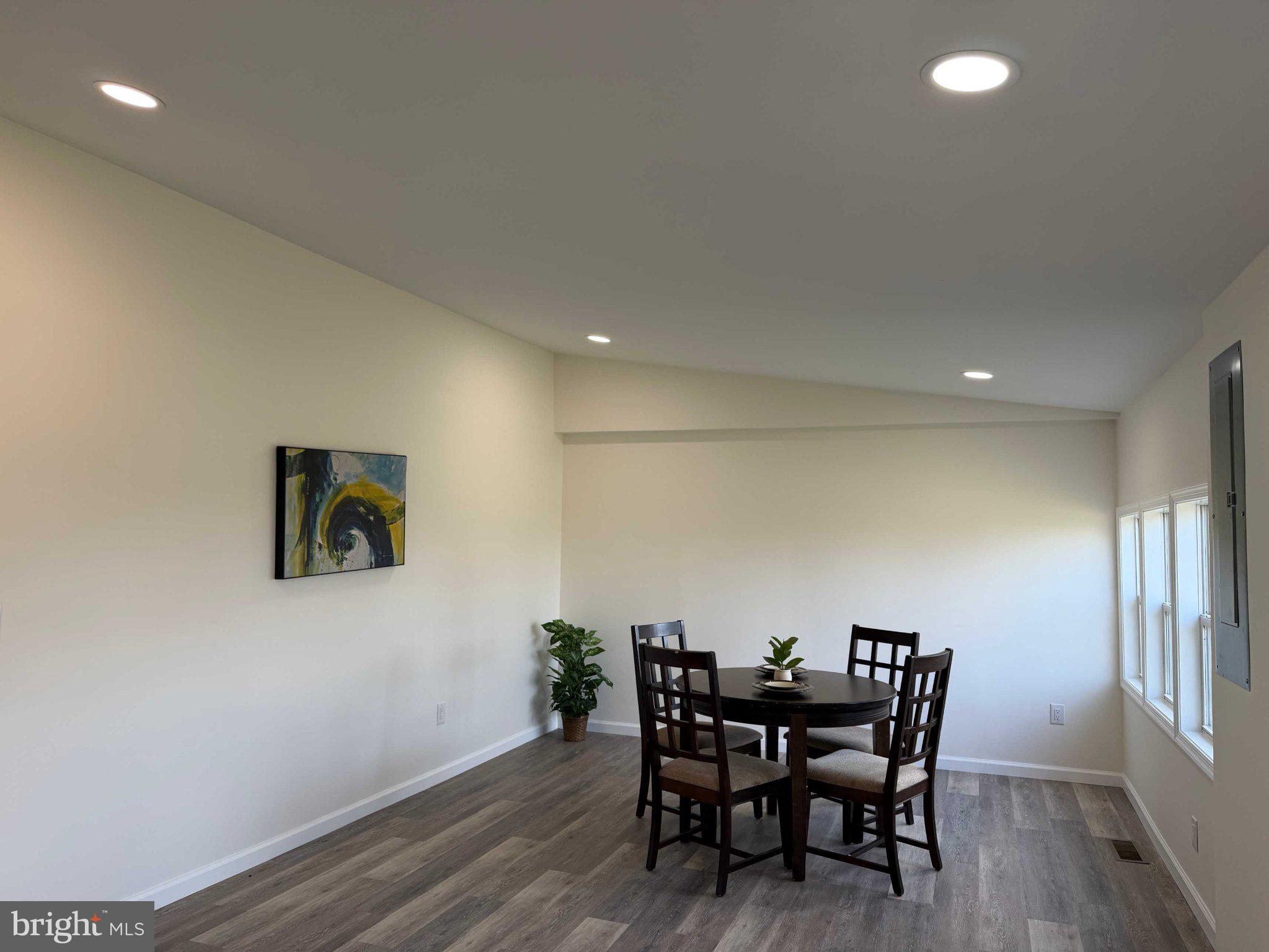 17335 Isdell Road Milford, DE 19963 - Photo 10 of 18 a view of a dining room with furniture and window