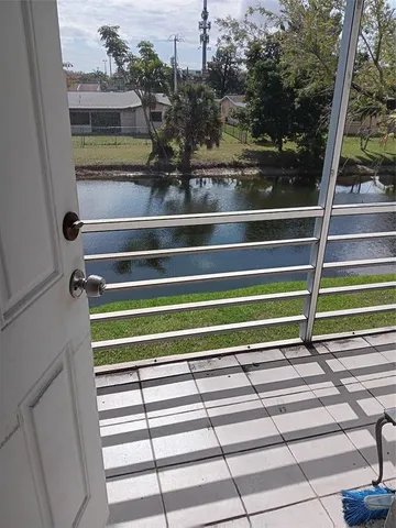 a bathroom with a toilet and a bathtub