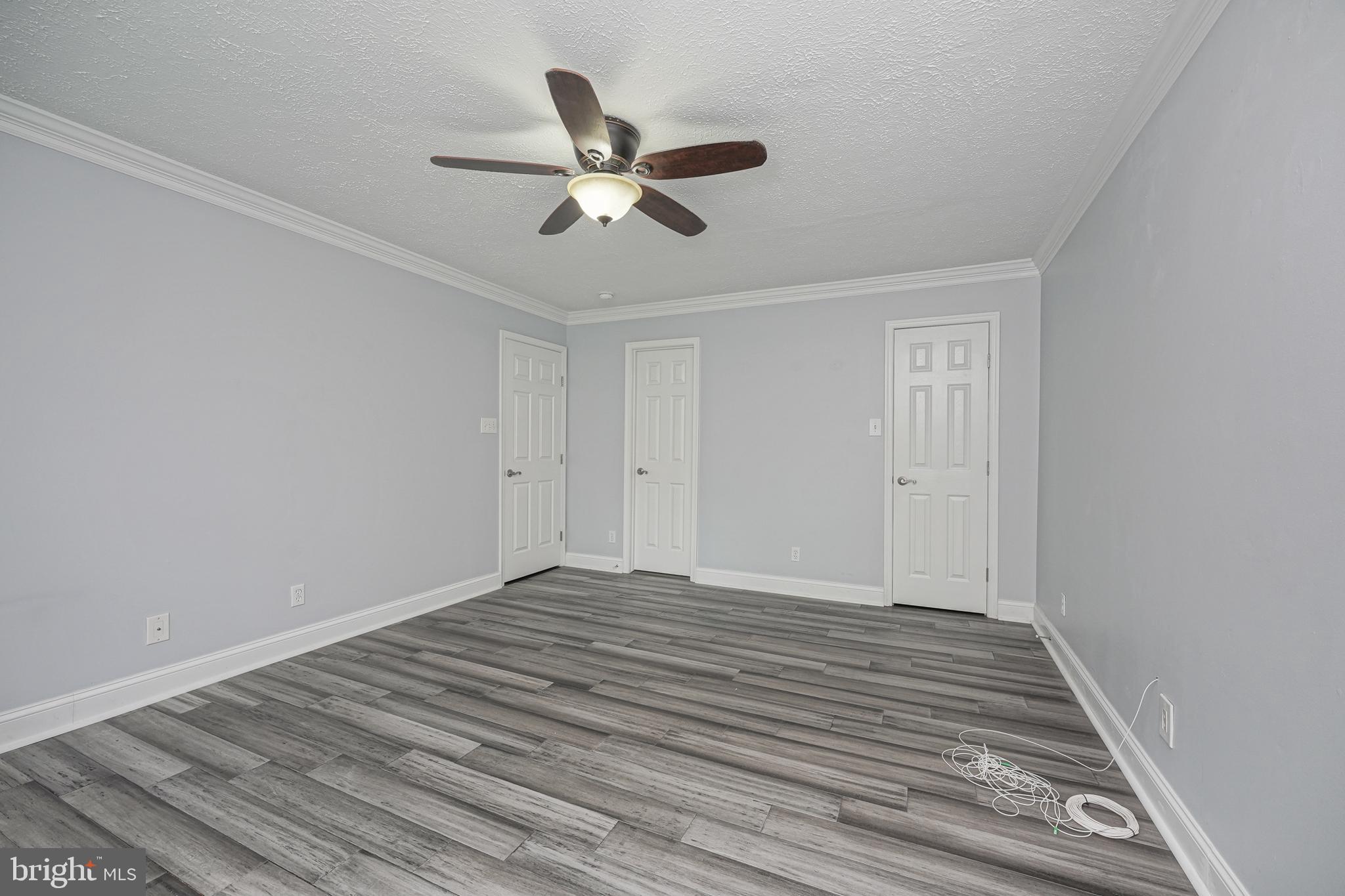 84 Eldon Way Marlton, NJ 08053 - Photo 15 of 27 a view of empty room with wooden floor