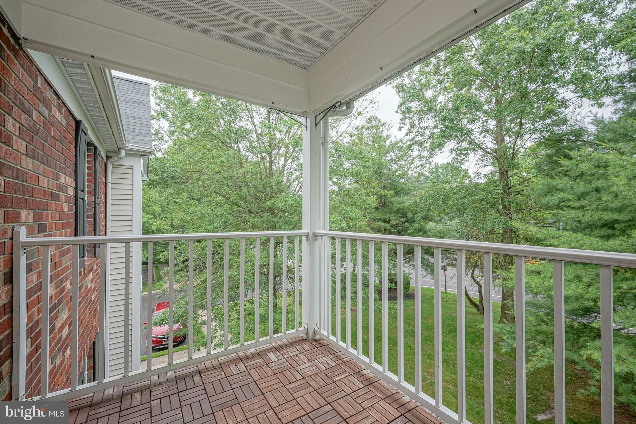 84 Eldon Way Marlton, NJ 08053 - Photo 27 of 27 a view of a balcony with wooden floor