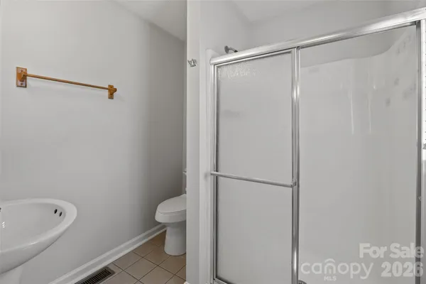 a bathroom with a bathtub and a toilet