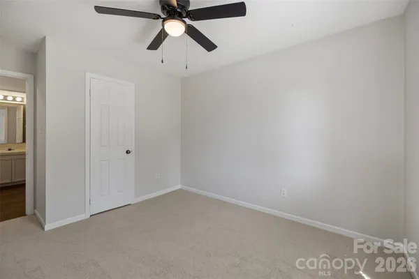a view of a small space with a fan