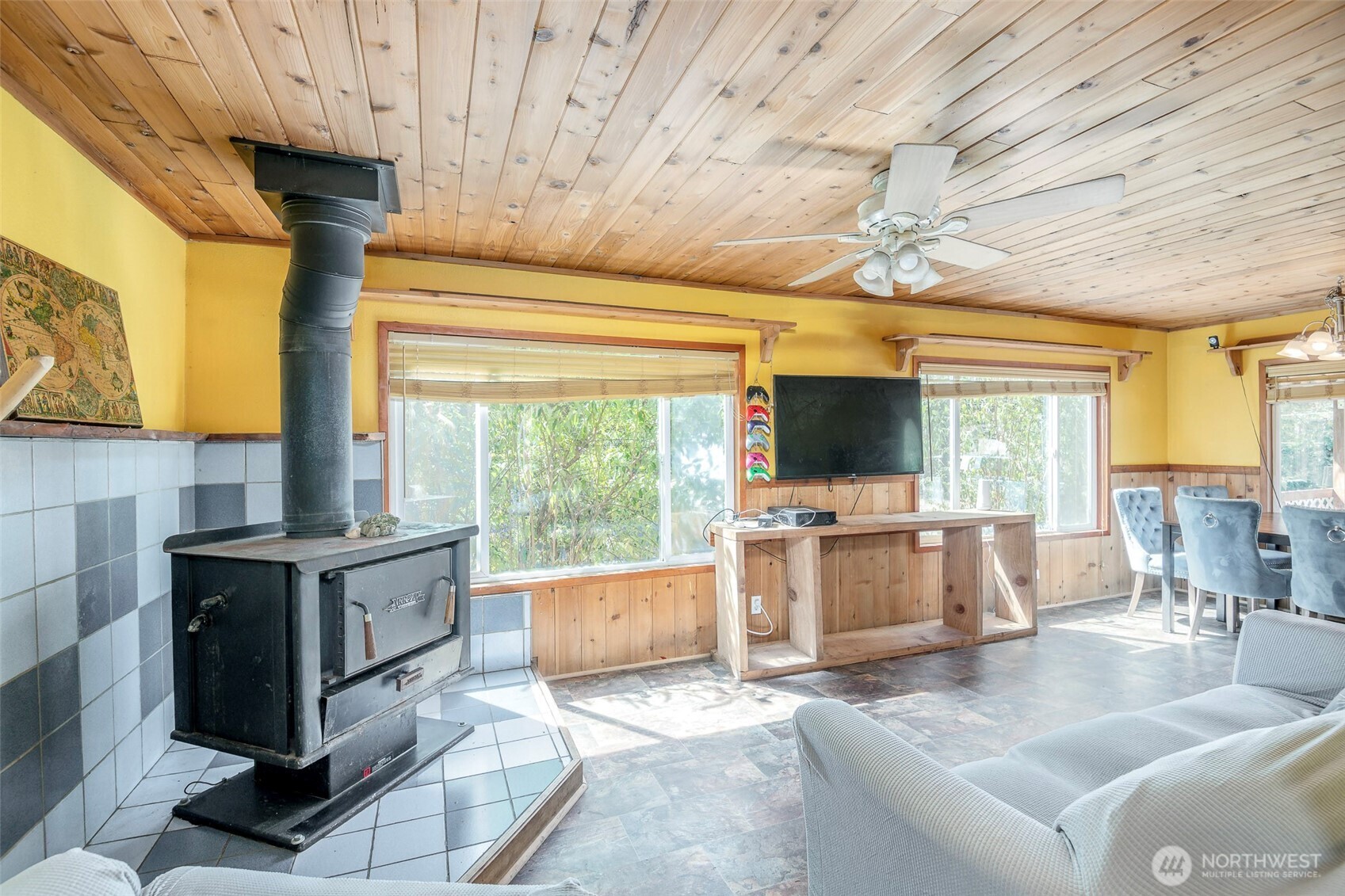 142 Gharet Road Randle, WA 98377 - Photo 11 of 32 a living room with furniture a flat screen tv and a fireplace
