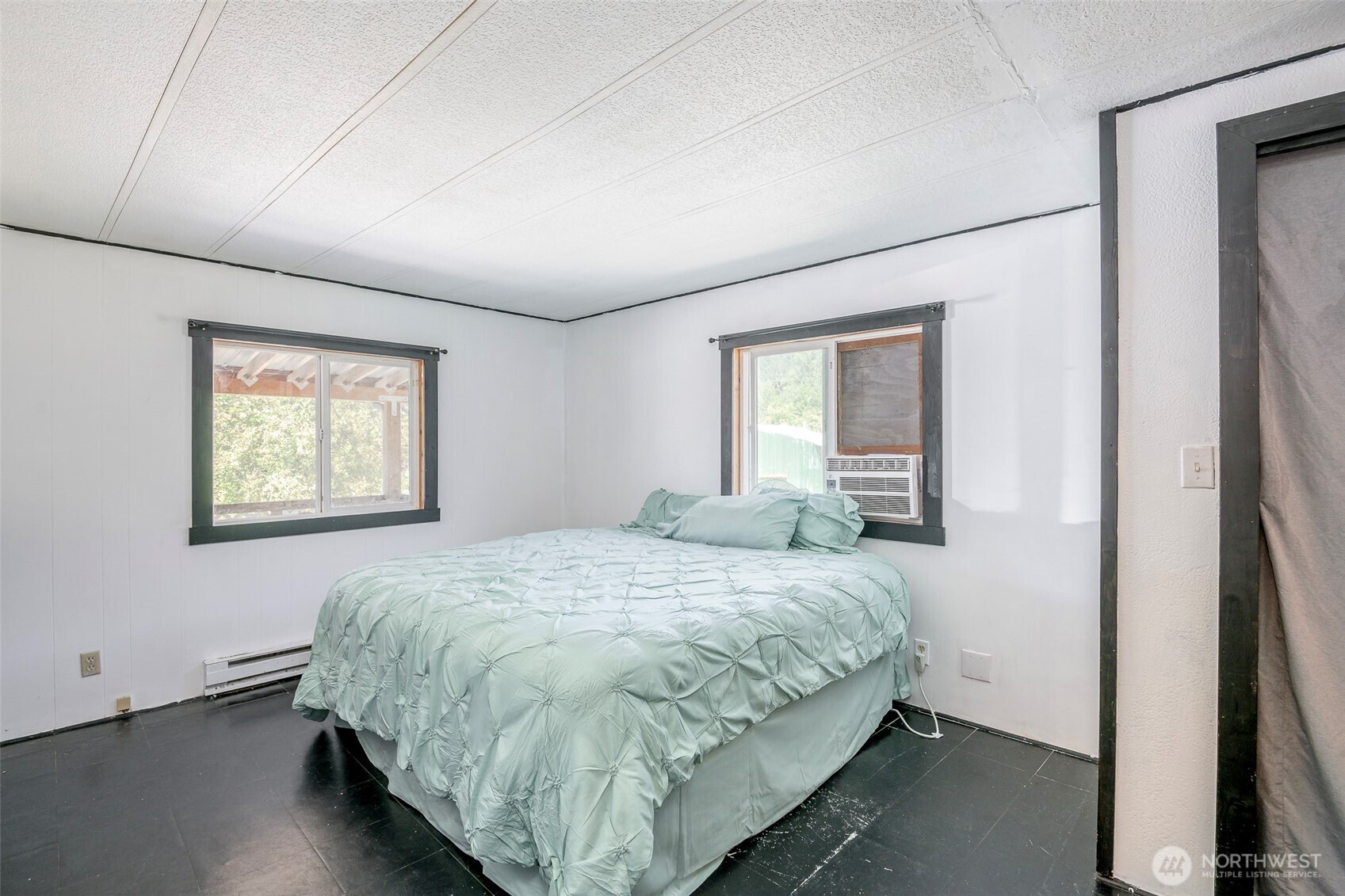 142 Gharet Road Randle, WA 98377 - Photo 19 of 32 a bedroom with a bed and window