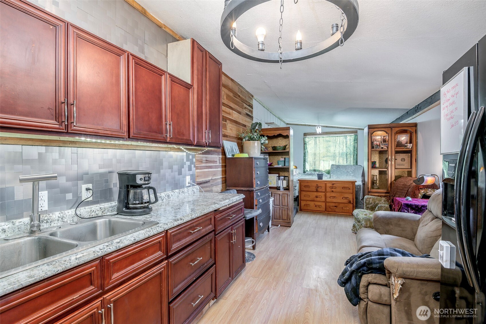 142 Gharet Road Randle, WA 98377 - Photo 27 of 32 a kitchen with stainless steel appliances granite countertop a sink dishwasher stove and cabinets