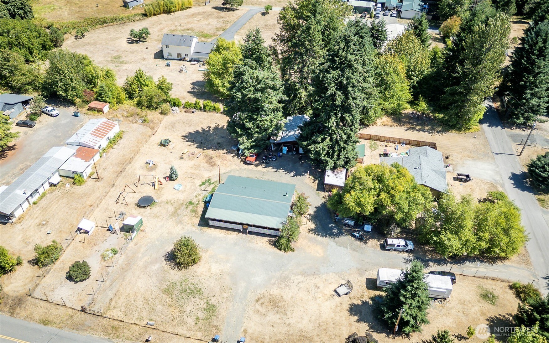142 Gharet Road Randle, WA 98377 - Photo 31 of 32 an aerial view of residential house with yard and swimming pool