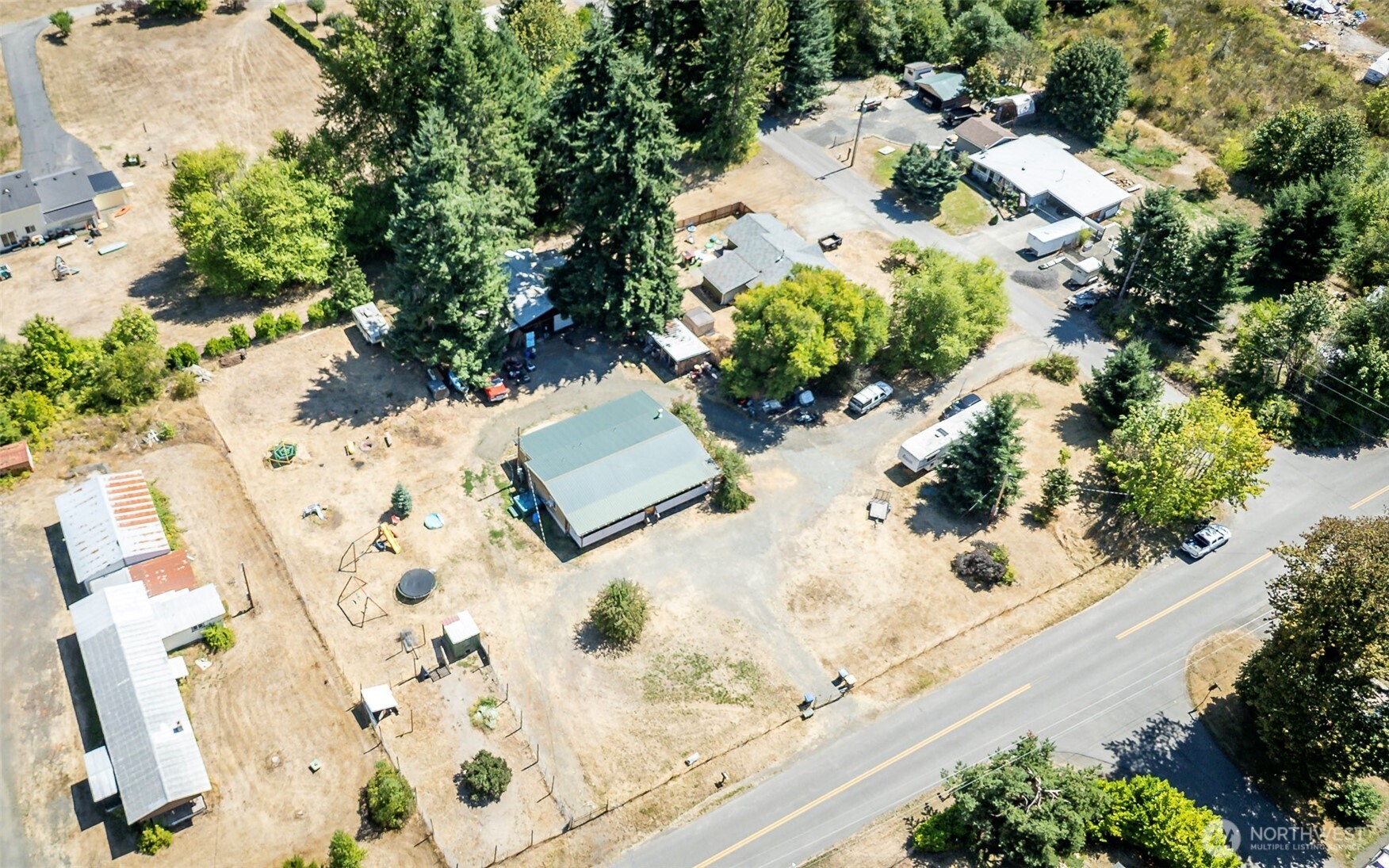 142 Gharet Road Randle, WA 98377 - Photo 32 of 32 an aerial view of a house with a yard covered in the outdoor